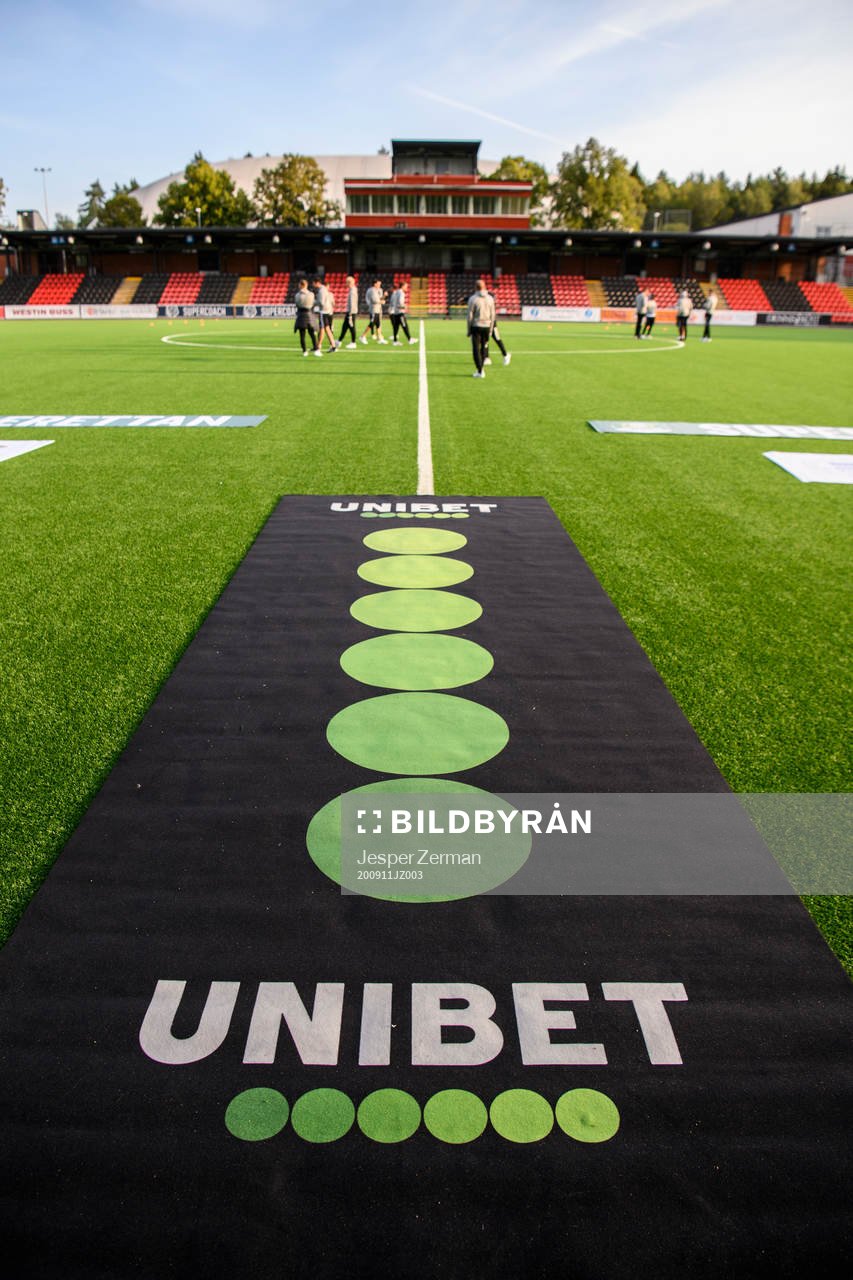 En matta med Unibets logotyp