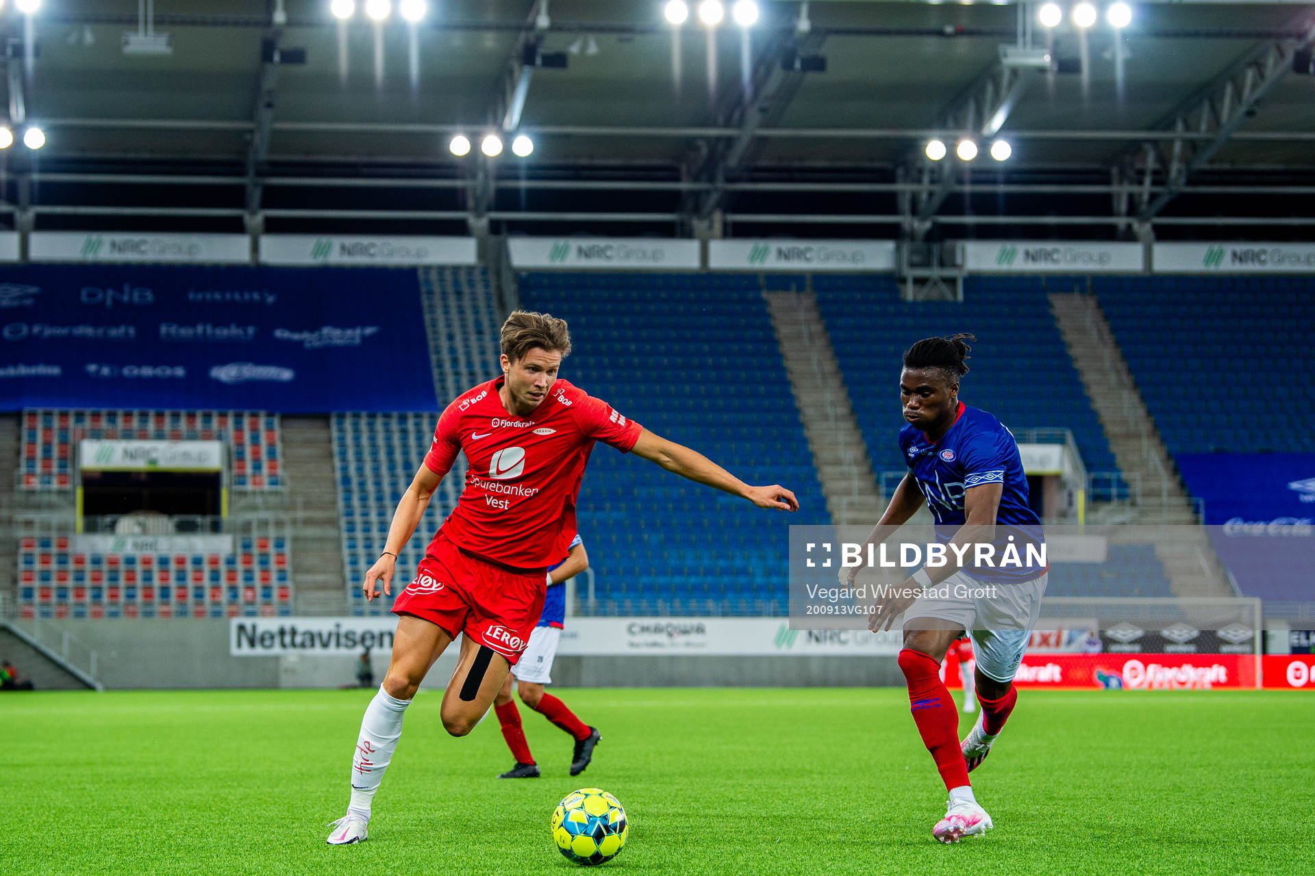 Erlend Hustad of Brann and Sam Adekugbe of Vålerenga during the Eliteserien football match between Vålerenga and Brann on September 13, 2020 in Oslo.