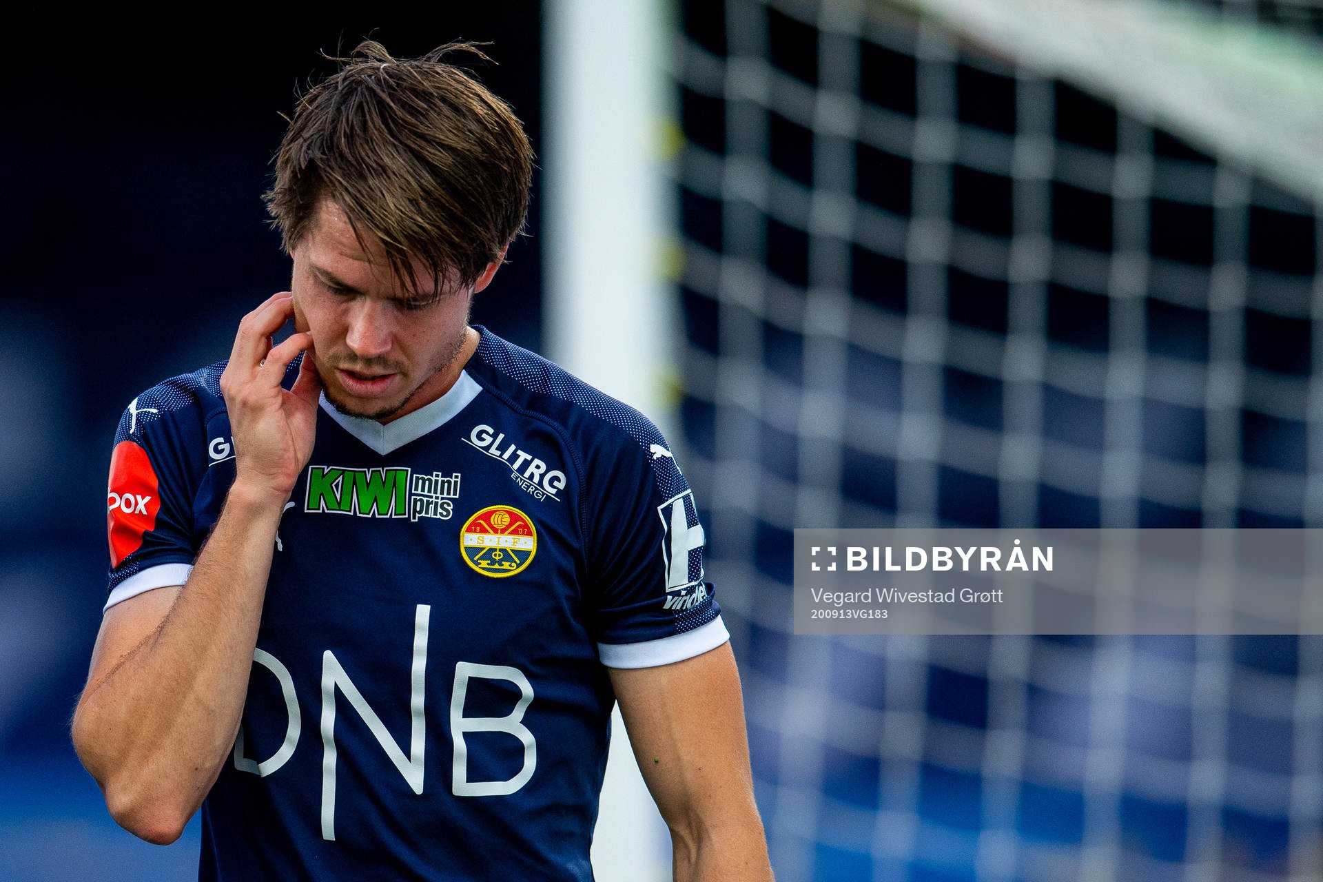 Lars Vilsvik of Strømsgodset with an injury