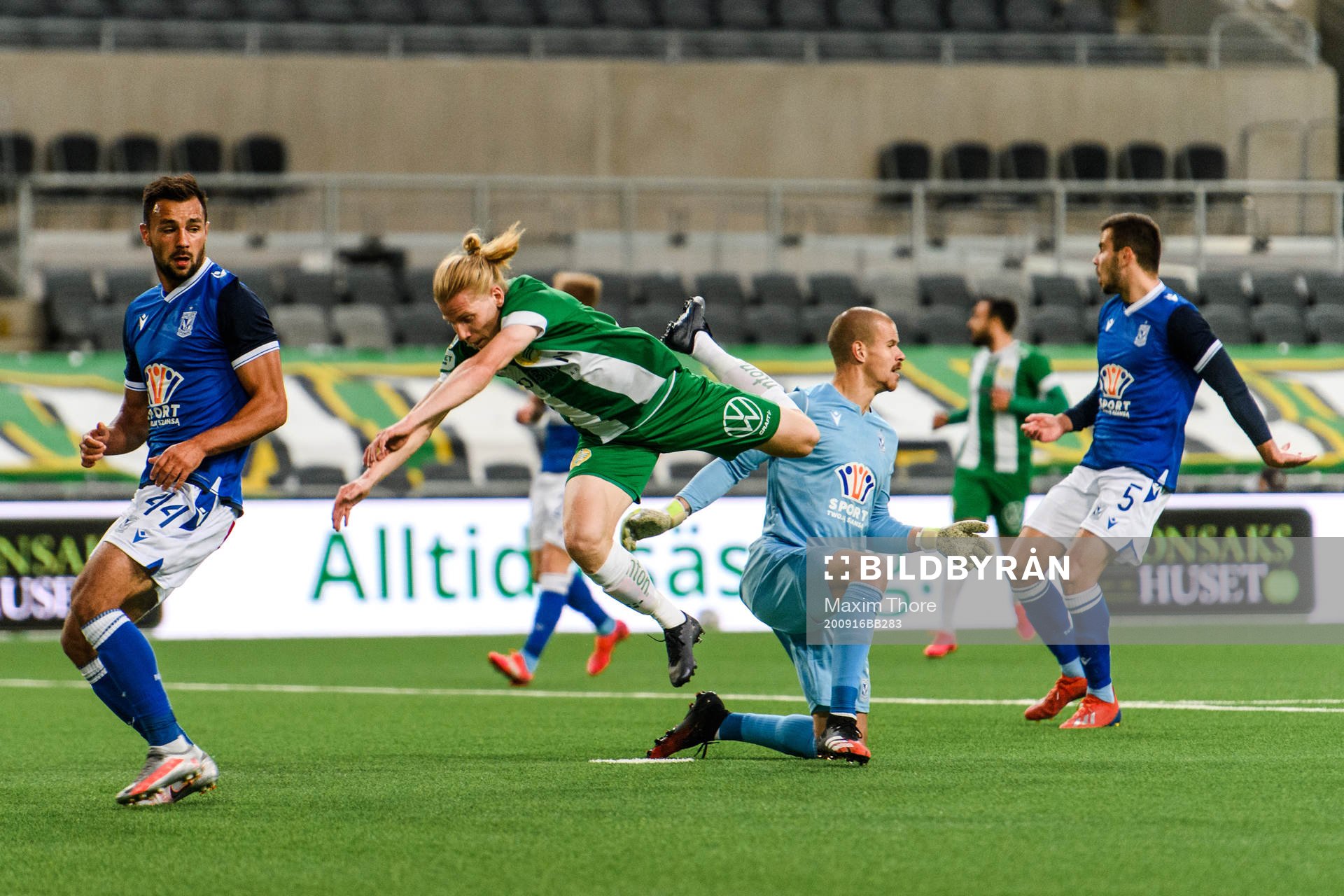 Gustav Ludwigson of Hammarby and goalkeeper Filip Bednarek