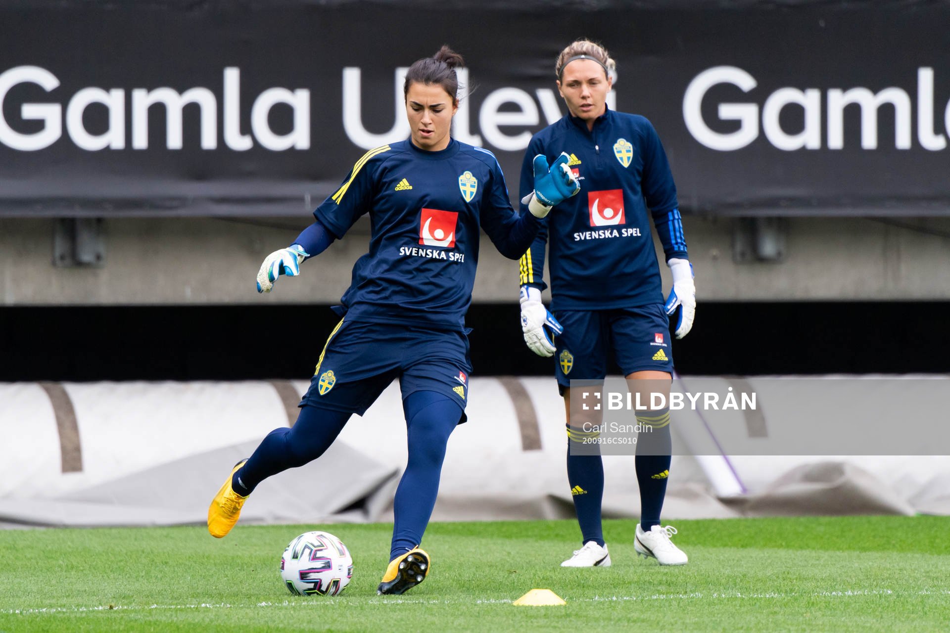 Goalkeeper Zecira Musovic and Jennifer Falk