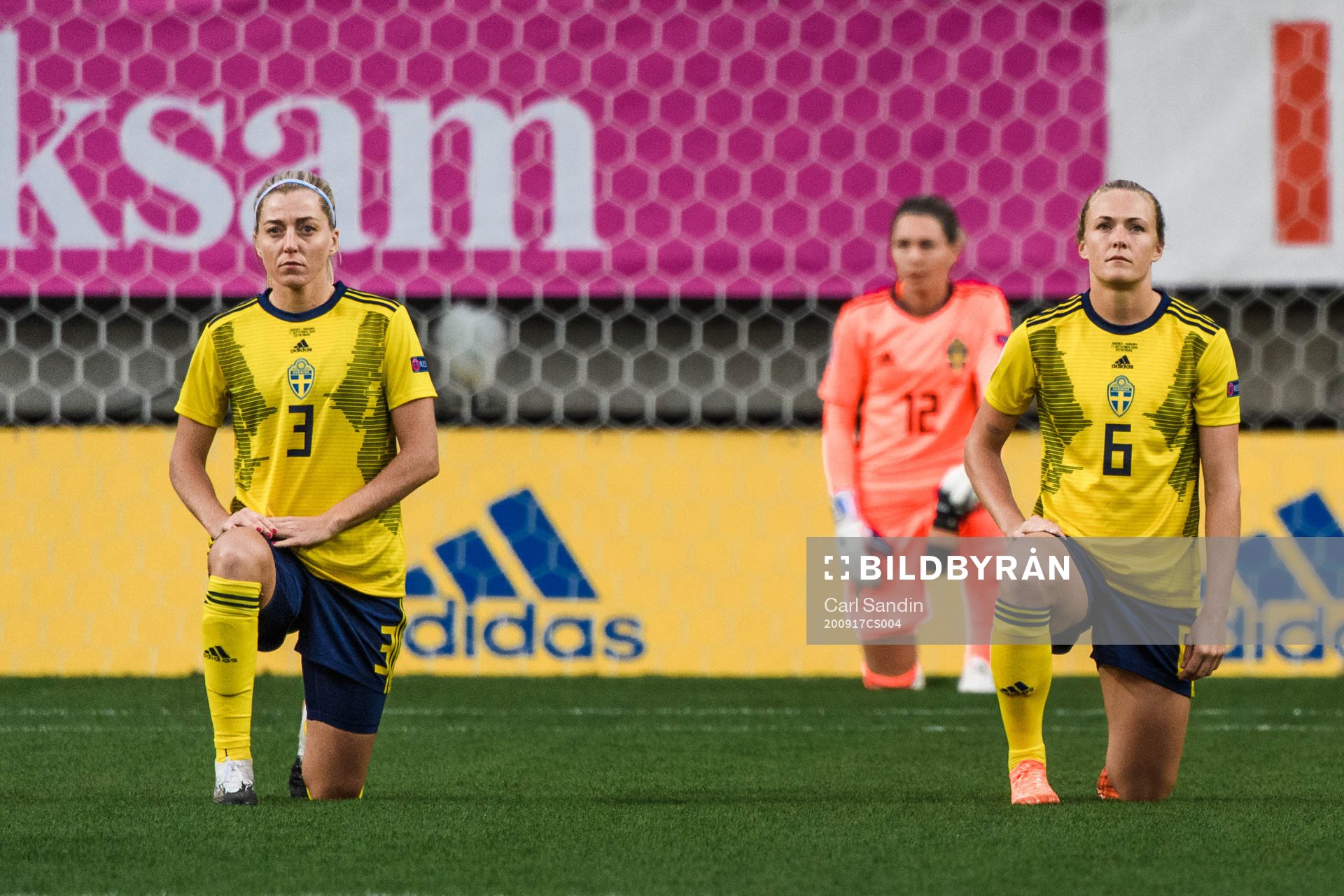 Linda Sembrant and Magdalena Eriksson of Sweden kneels in