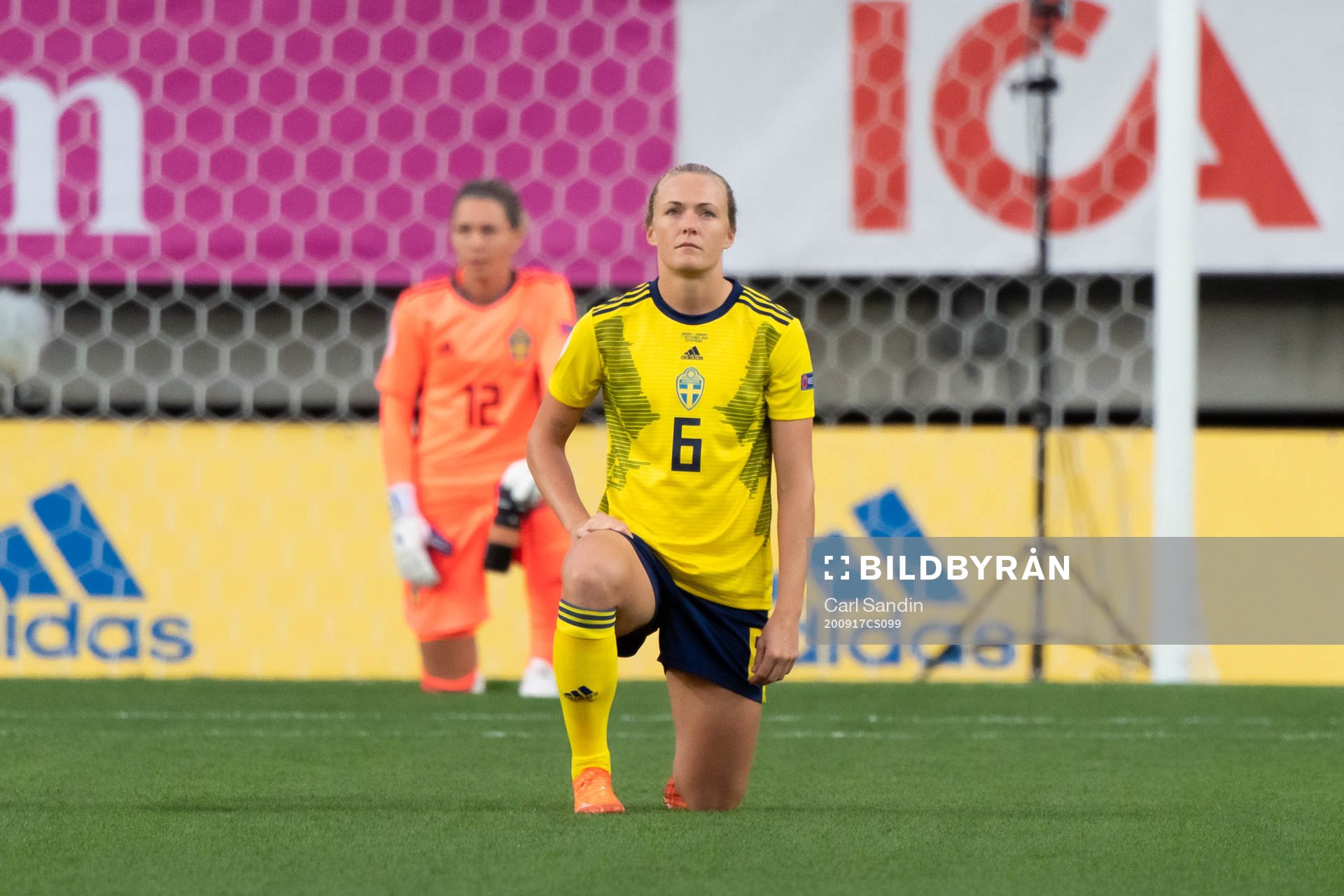 Magdalena Eriksson of Sweden kneels in support of the