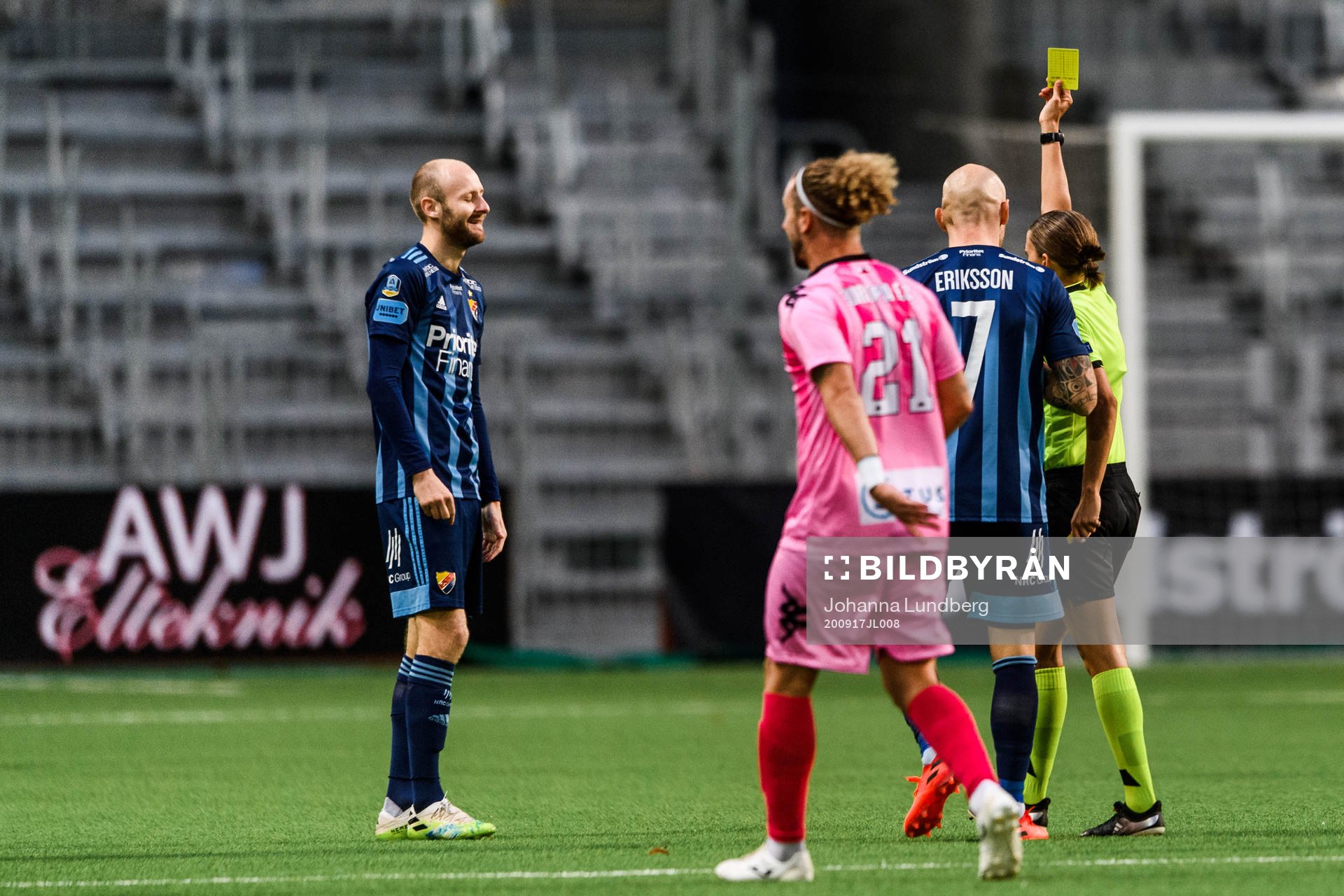 Curtis Edwards of Djurgården receives a yellow card