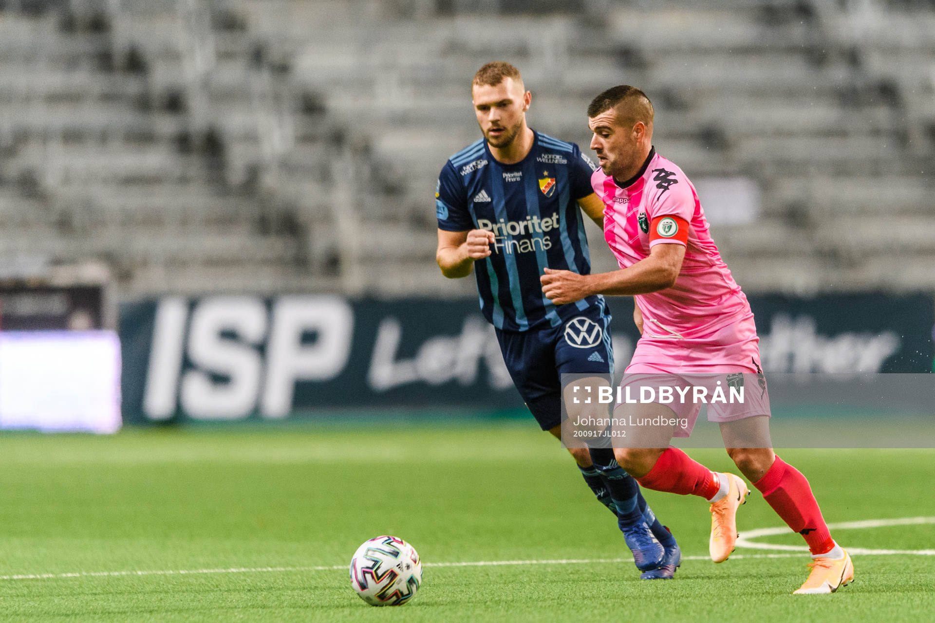 Jesper Karlström of Djurgården and Liam Walker of Europa FC during the UEFA Europa League qualifying match between Djurgården and Europa FC on September 17, 2020 in Stockholm.