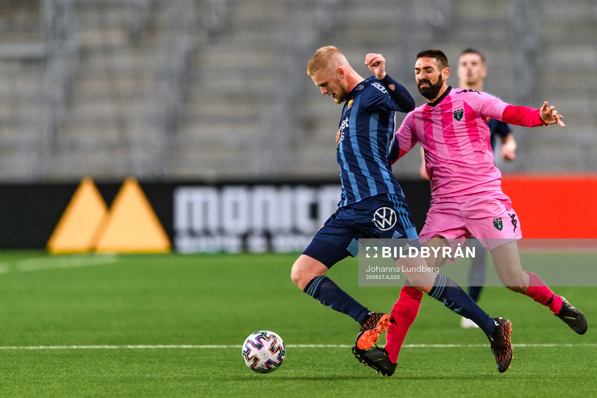 Kalle Holmberg of Djurgården and Olmo González Casado of Europa FC during the UEFA Europa League qualifying match between Djurgården and Europa FC on September 17, 2020 in Stockholm.