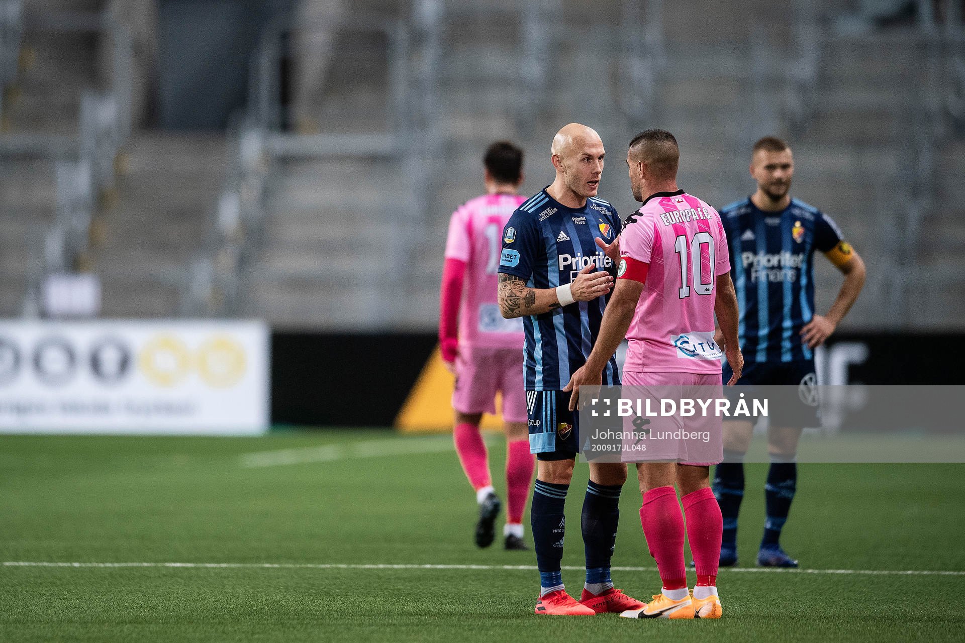 Magnus Eriksson of Djurgården and Liam Walker of Europa FC during the UEFA Europa League qualifying match between Djurgården and Europa FC on September 17, 2020 in Stockholm.