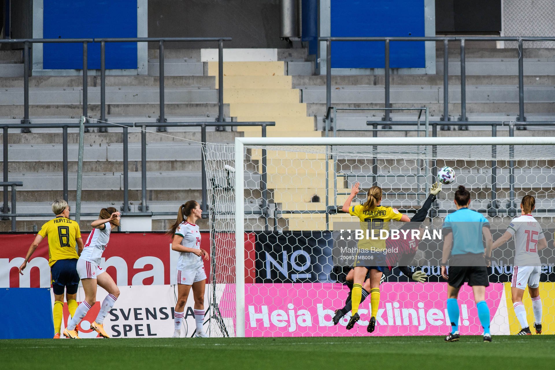 Lina Hurtig of Sweden scores the 1-0 goal behind goalkeeper
