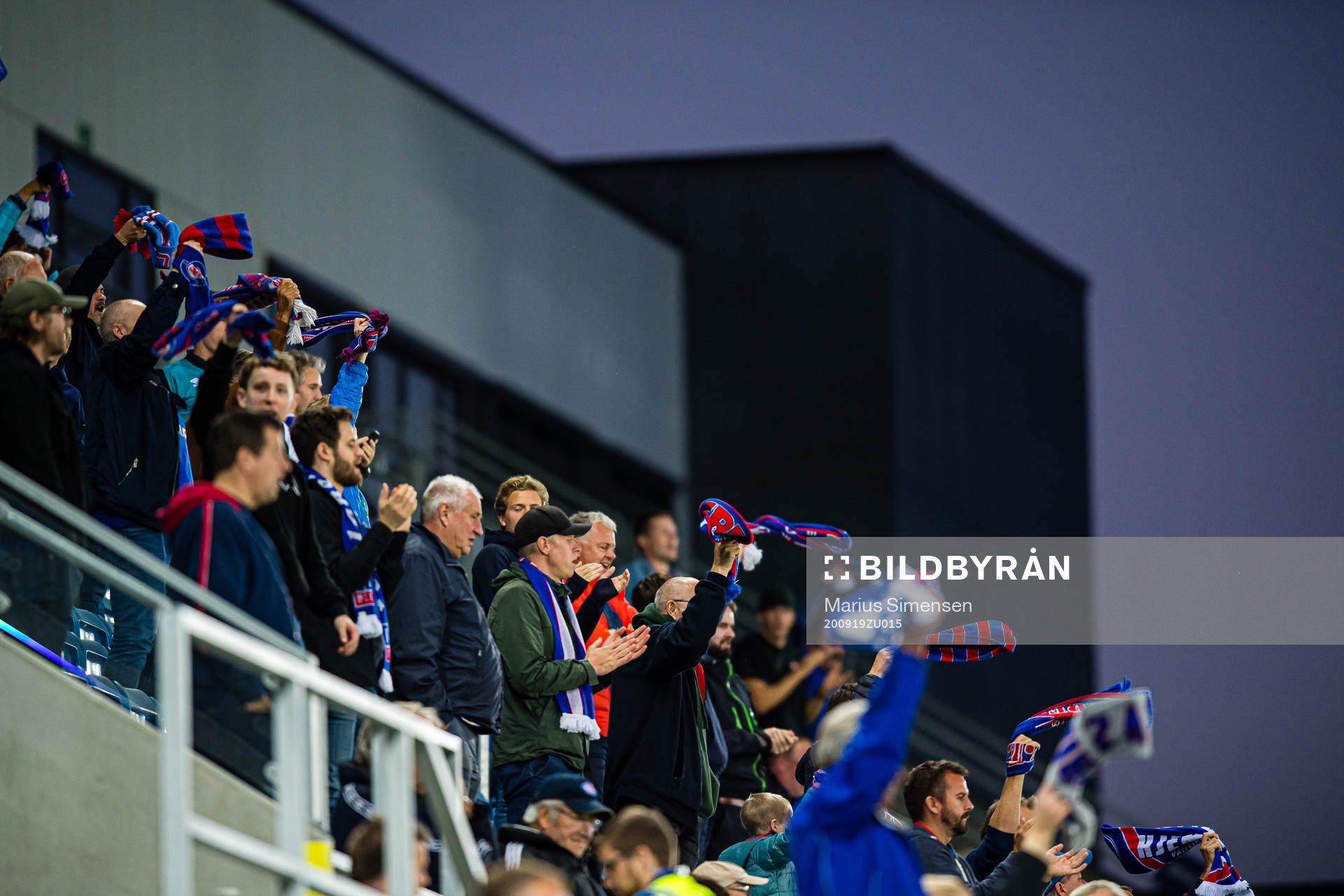 Spectators in the stands celebrates