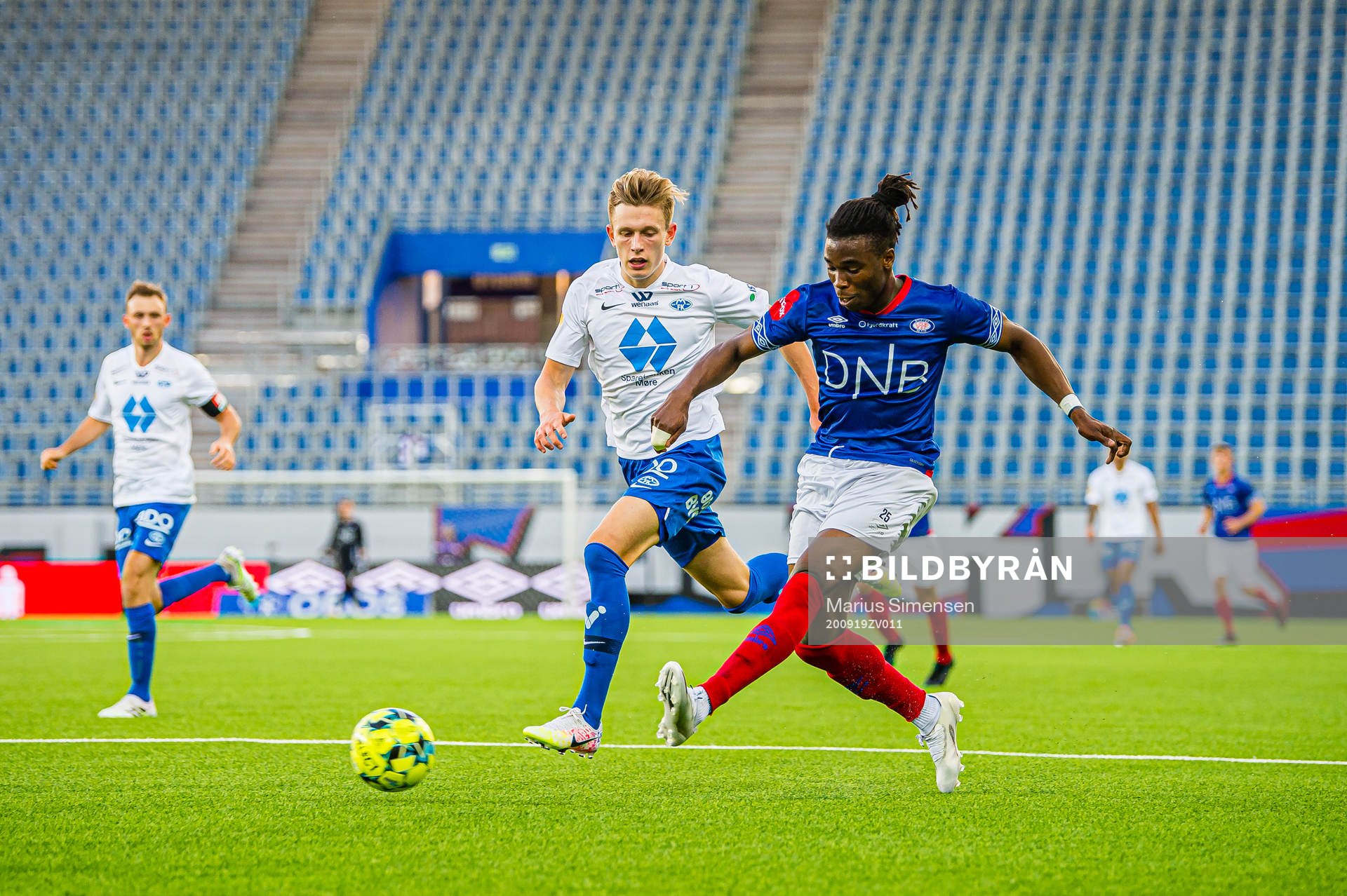 Marcus Holmgren Pedersen of Molde and Samuel Ayomide
