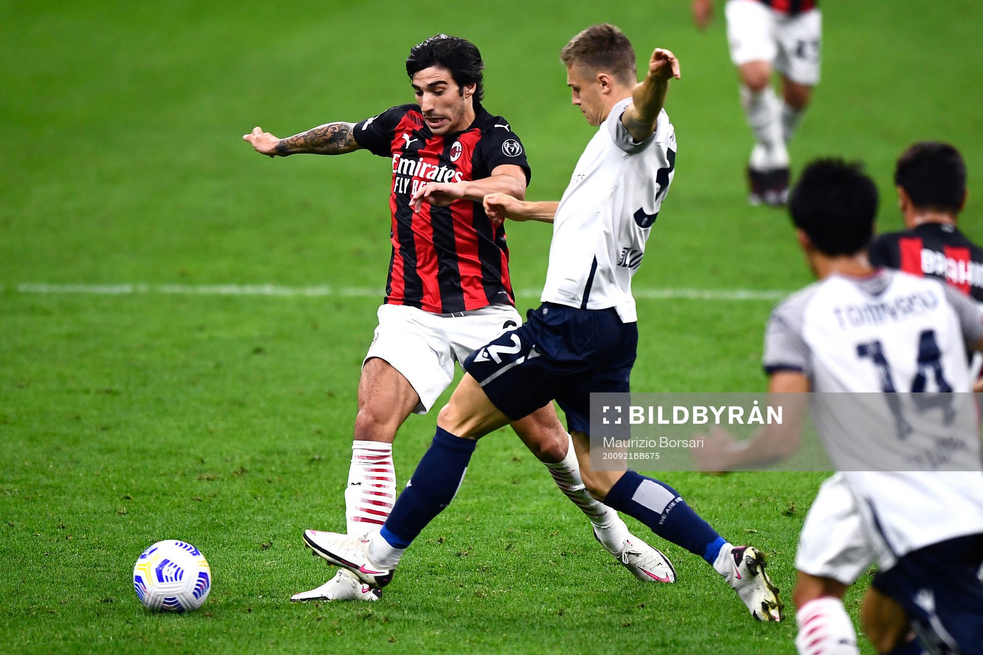 Mattias Svanberg of Bologna against Sandro Tonali of AC