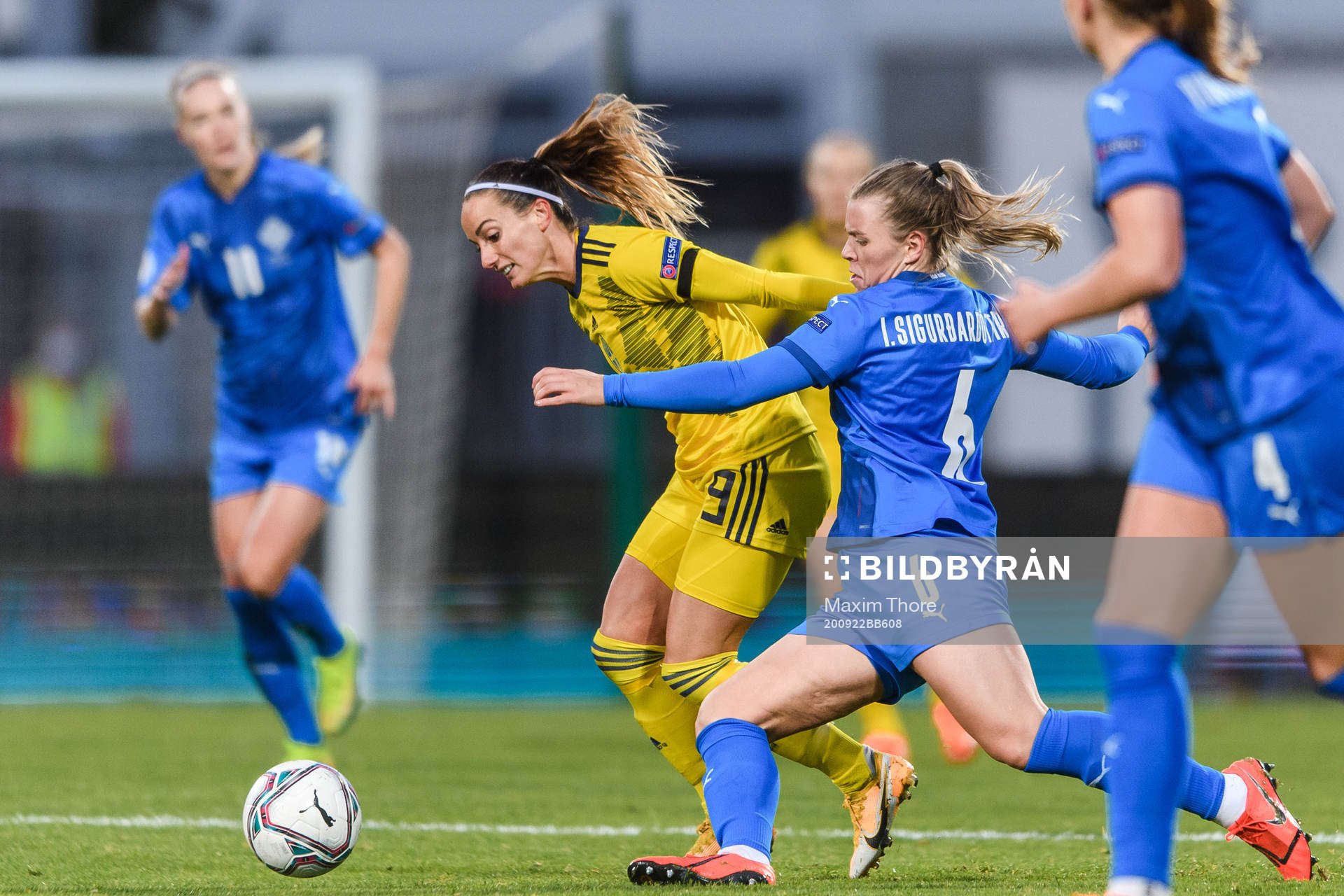 Kosovare Asllani of Sweden and Glodis Perla Viggosdottir of