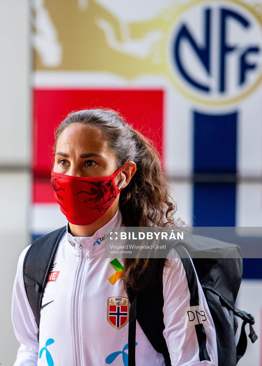 Ingrid Moe Wold of Norway arrives wearing a face mask