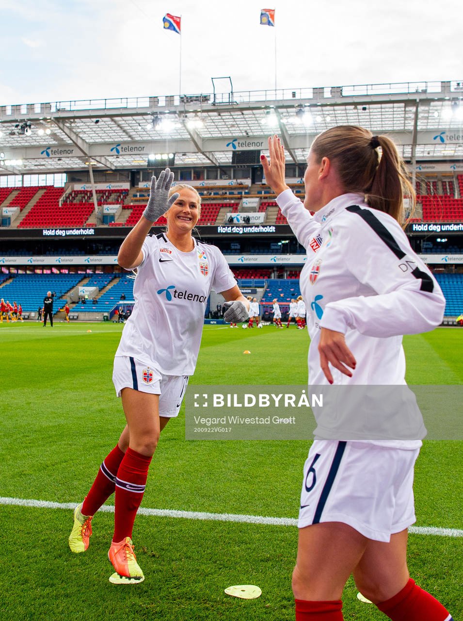 Lisa-Marie Karlseng Utland and Maren Mjelde of Norway warm