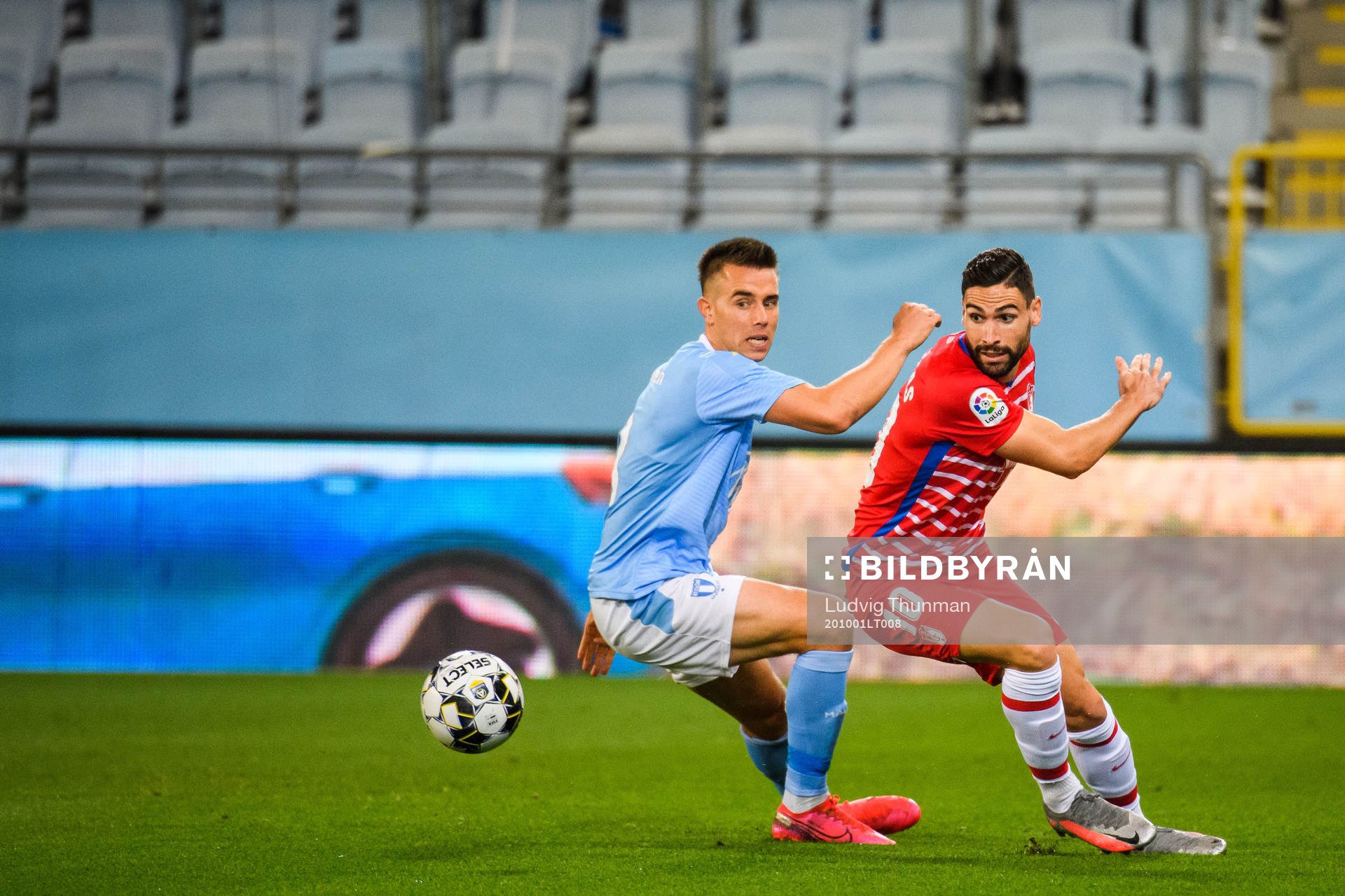 Jonas Knudsen of Malmö FF and Roberto Soldado of Granada