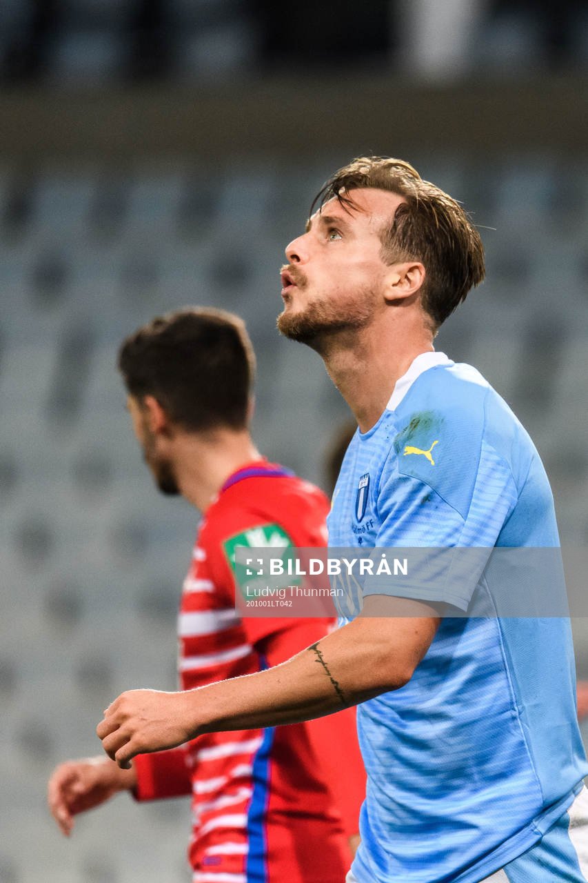 Eric Larsson of Malmö FF looks dejected