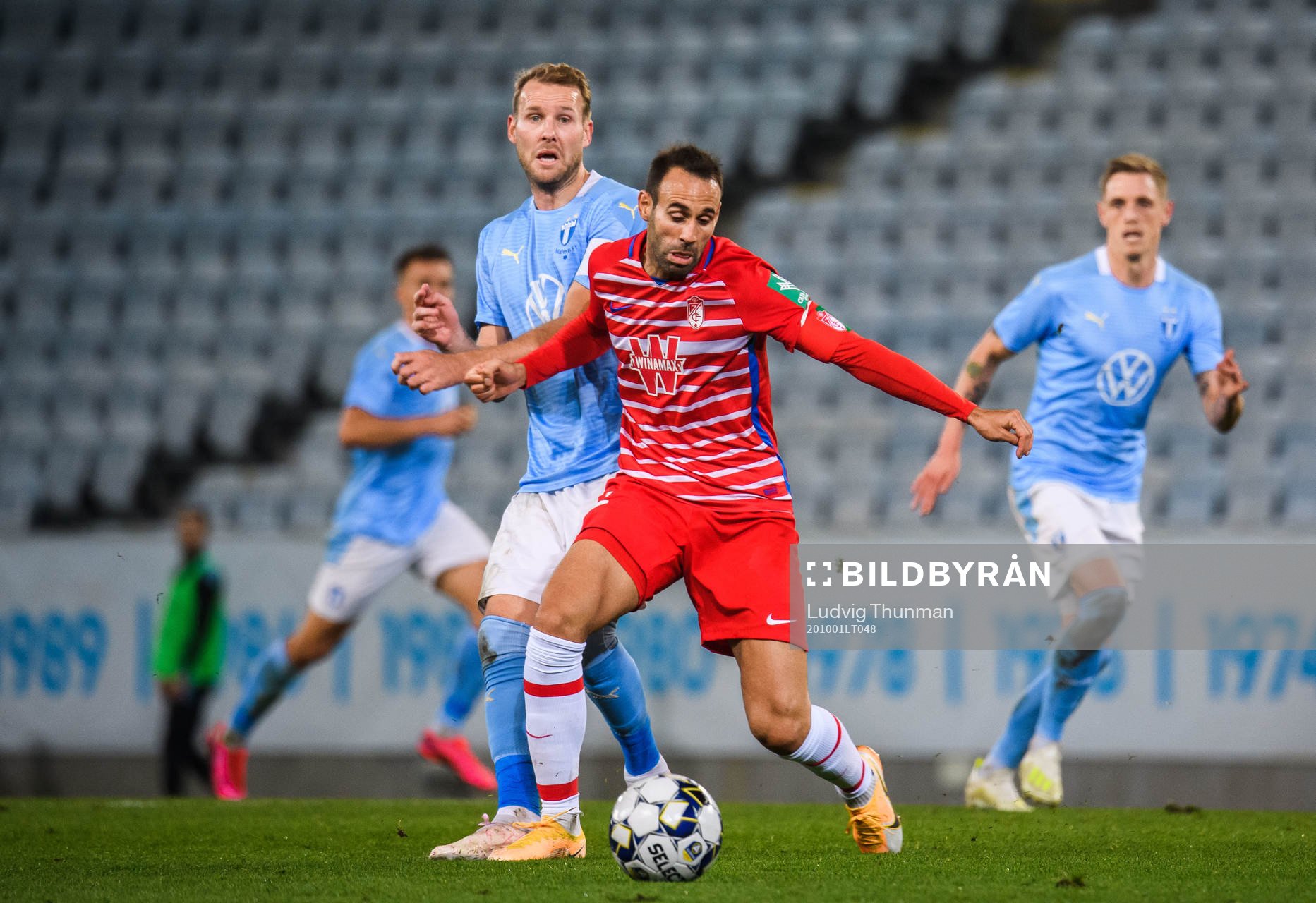Victor Diaz of Granada and Ola Toivonen of Malmö FF