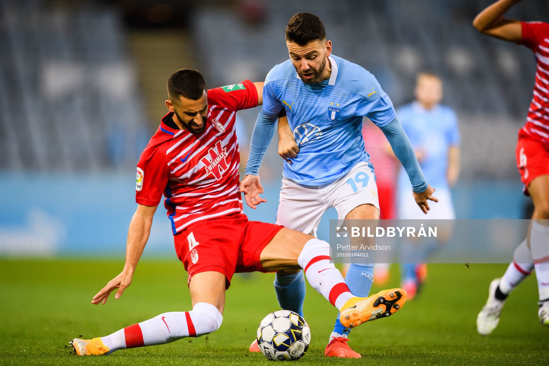 Gonalons of Granada and Erdal Rakip of Malmö FF
