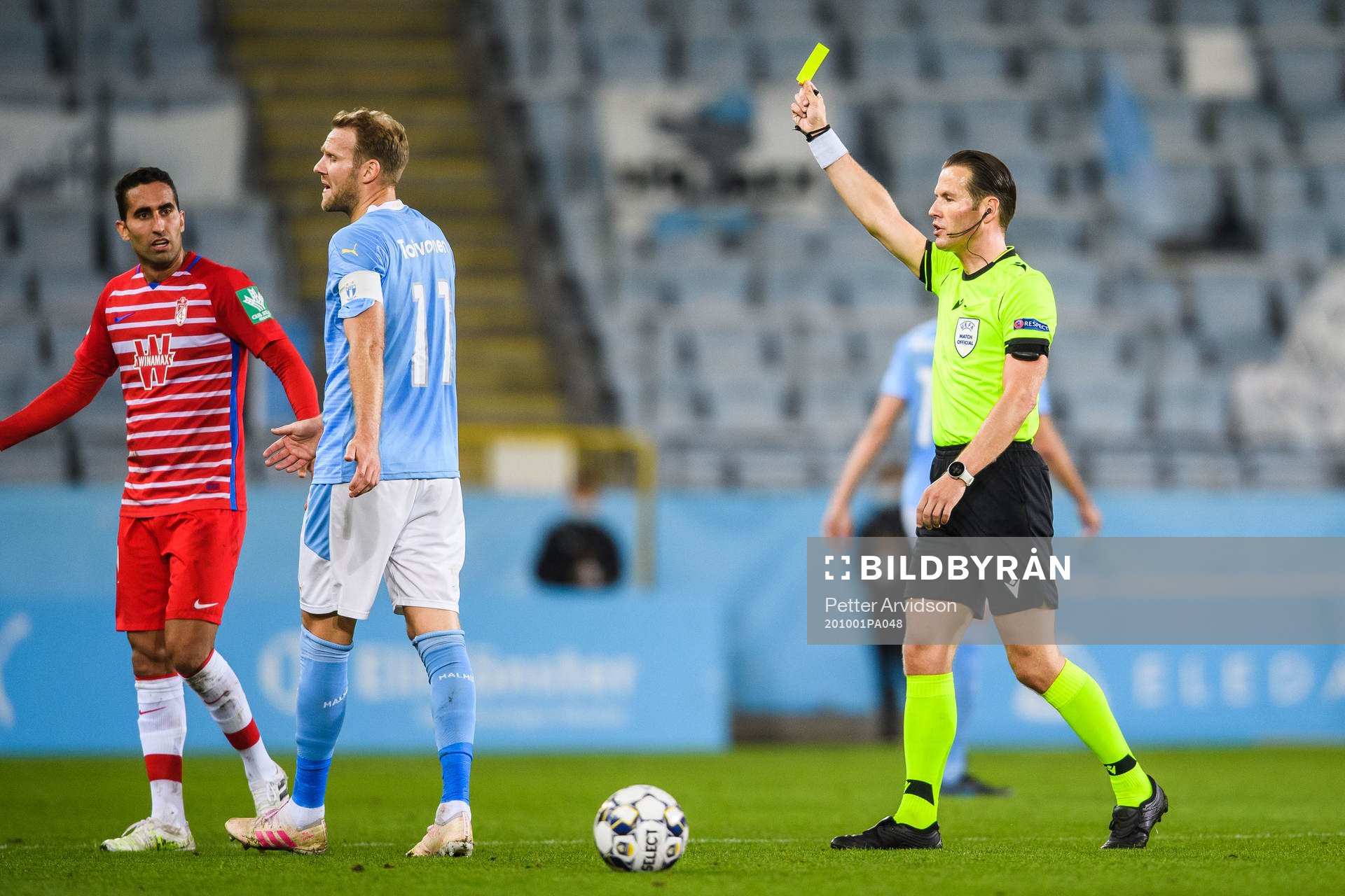 Ola Toivonen of Malmö FF receives a warning from referee