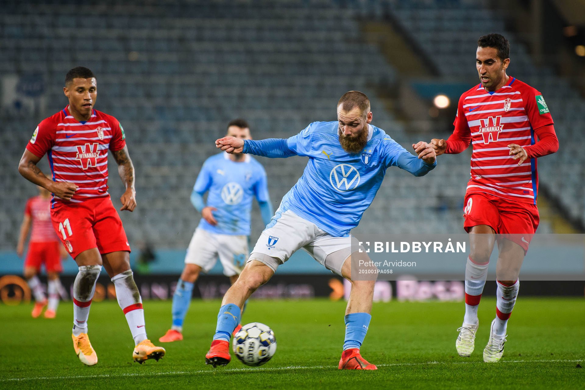 Jo Inge Berget of Malmö FF and Angel Montoro of Granada