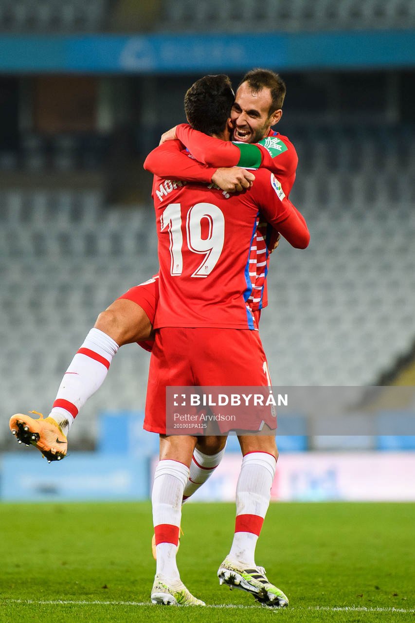 Victor Diaz and Angel Montoro of Granada celebrate