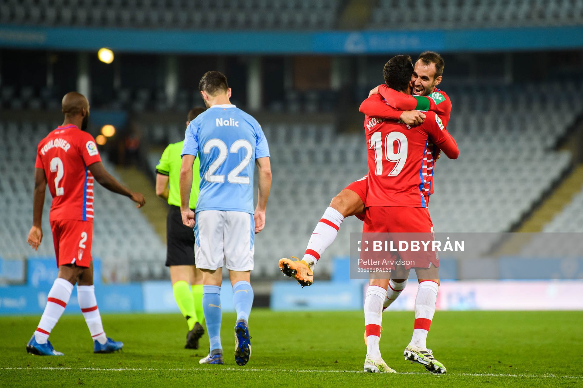Victor Diaz and Angel Montoro of Granada celebrate