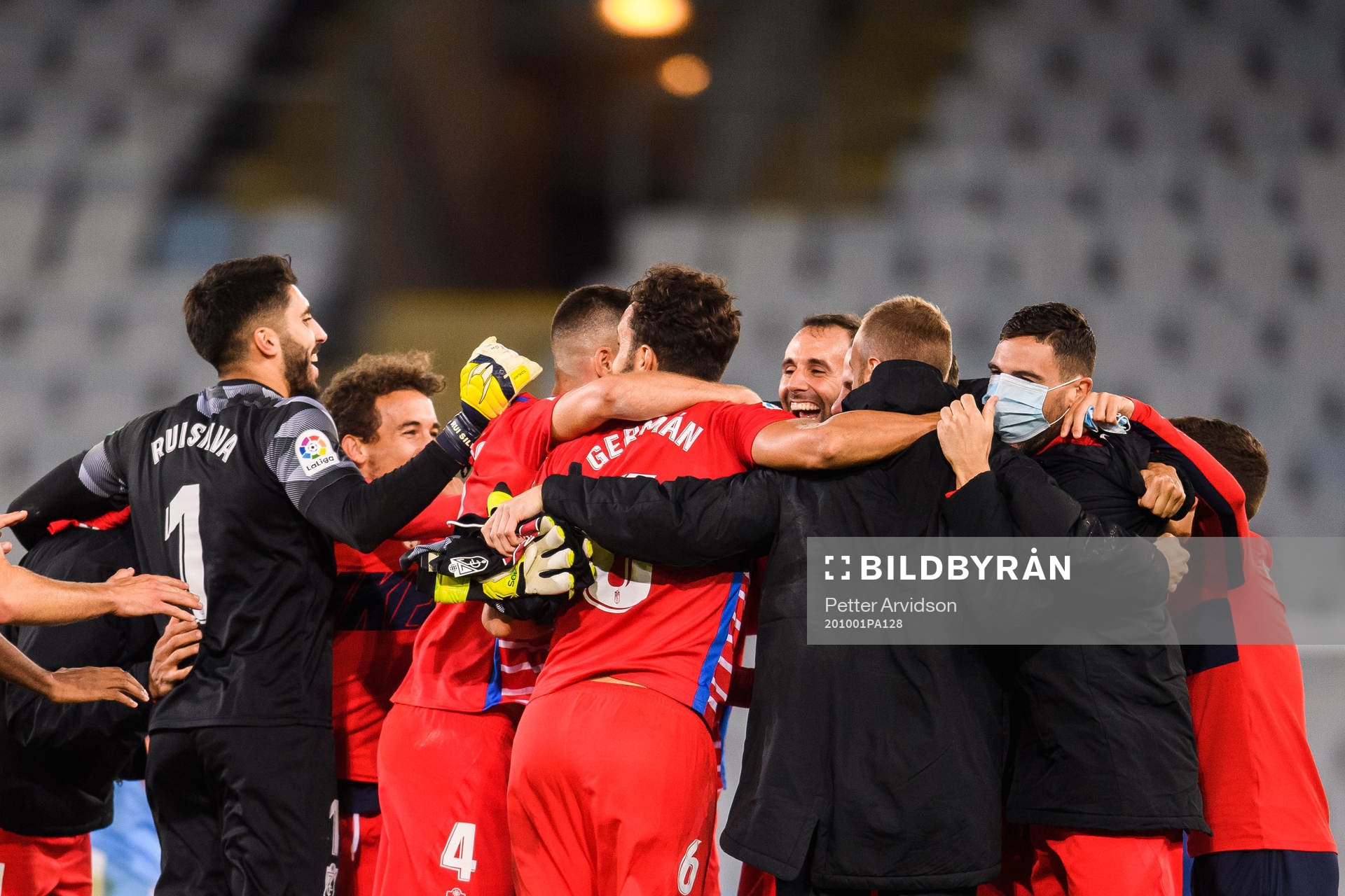 Players of Granada celebrate