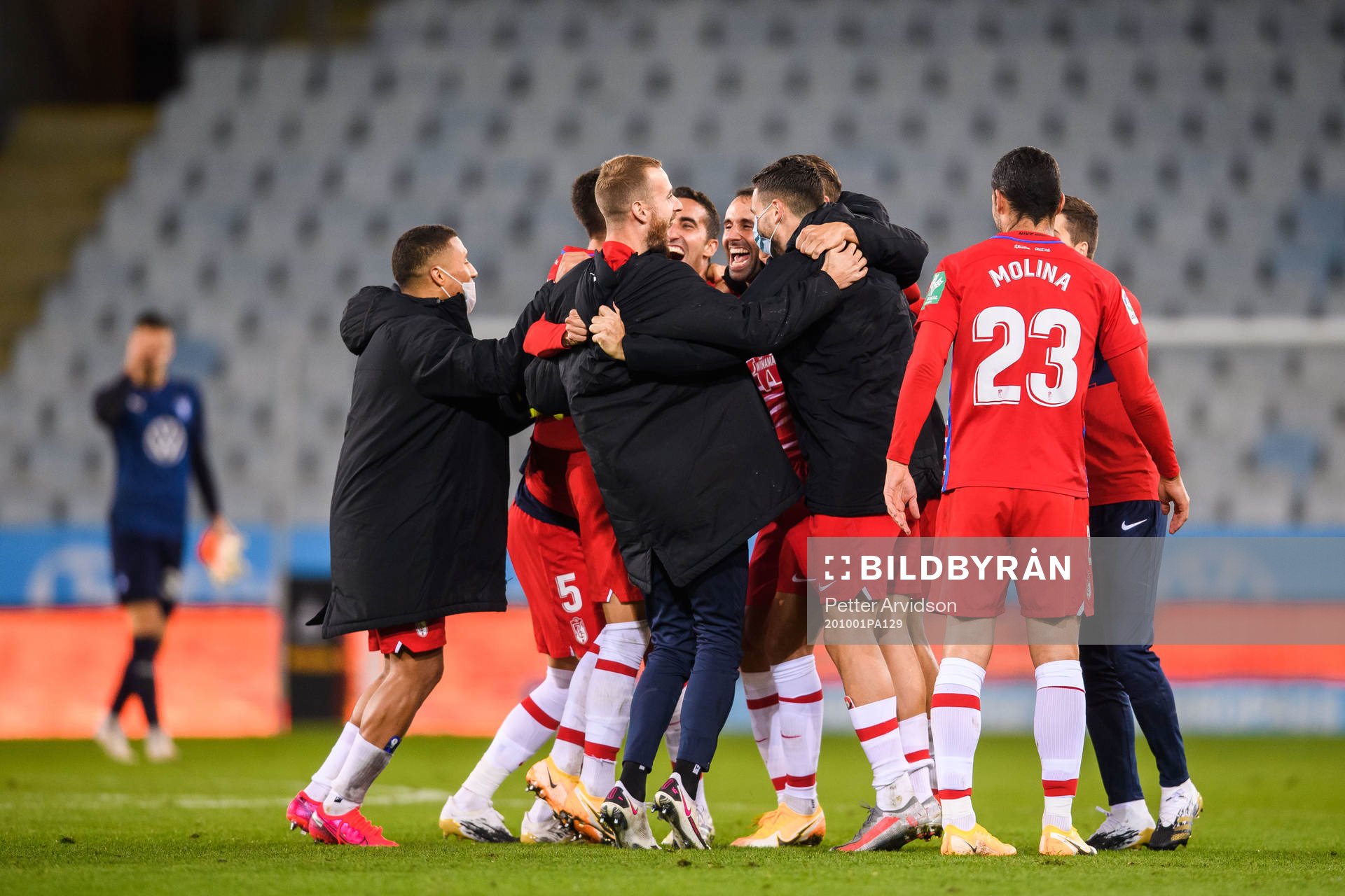 Players of Granada celebrate