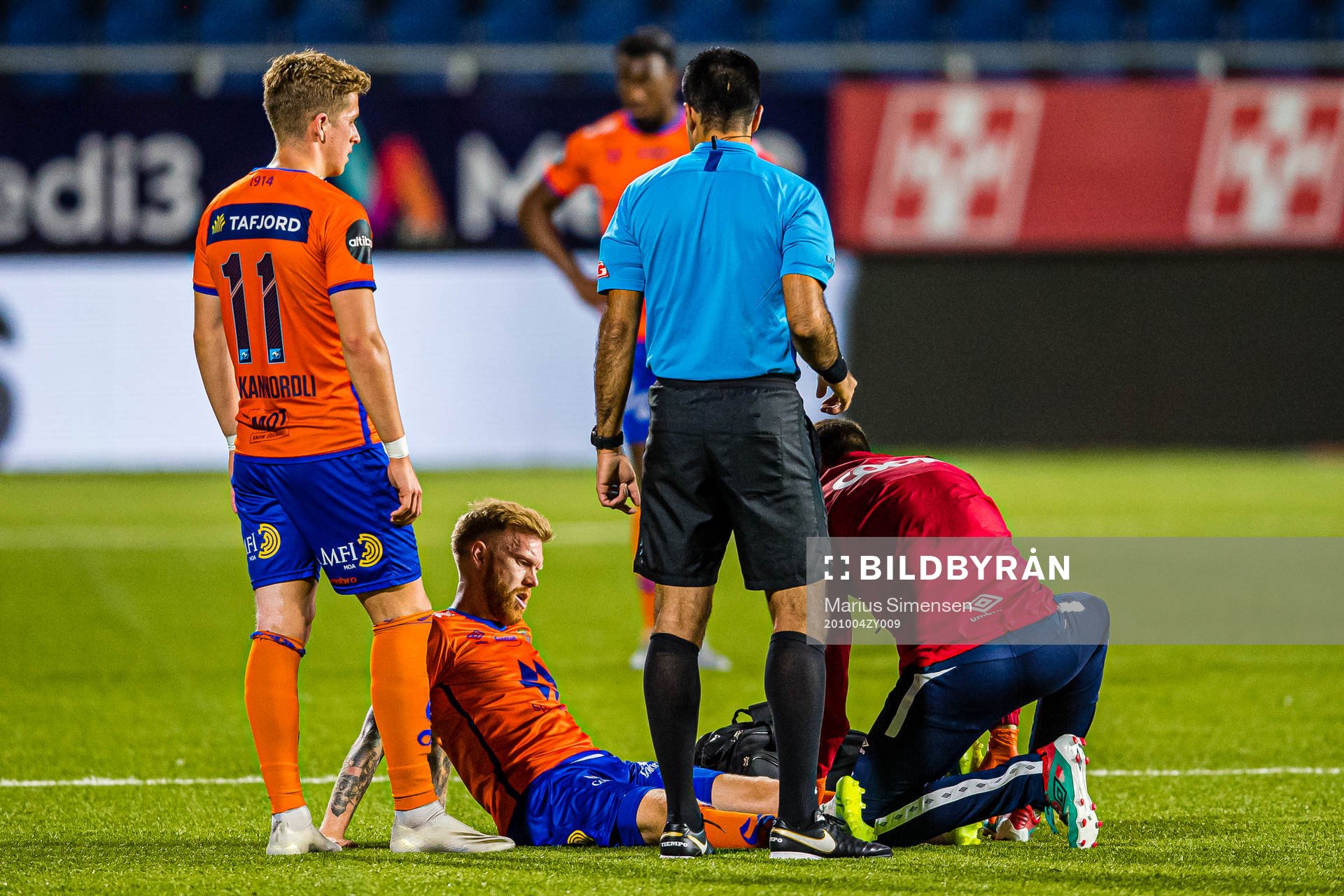 Fredrik Kjernmoen Carlsen of Aalesund with an injury
