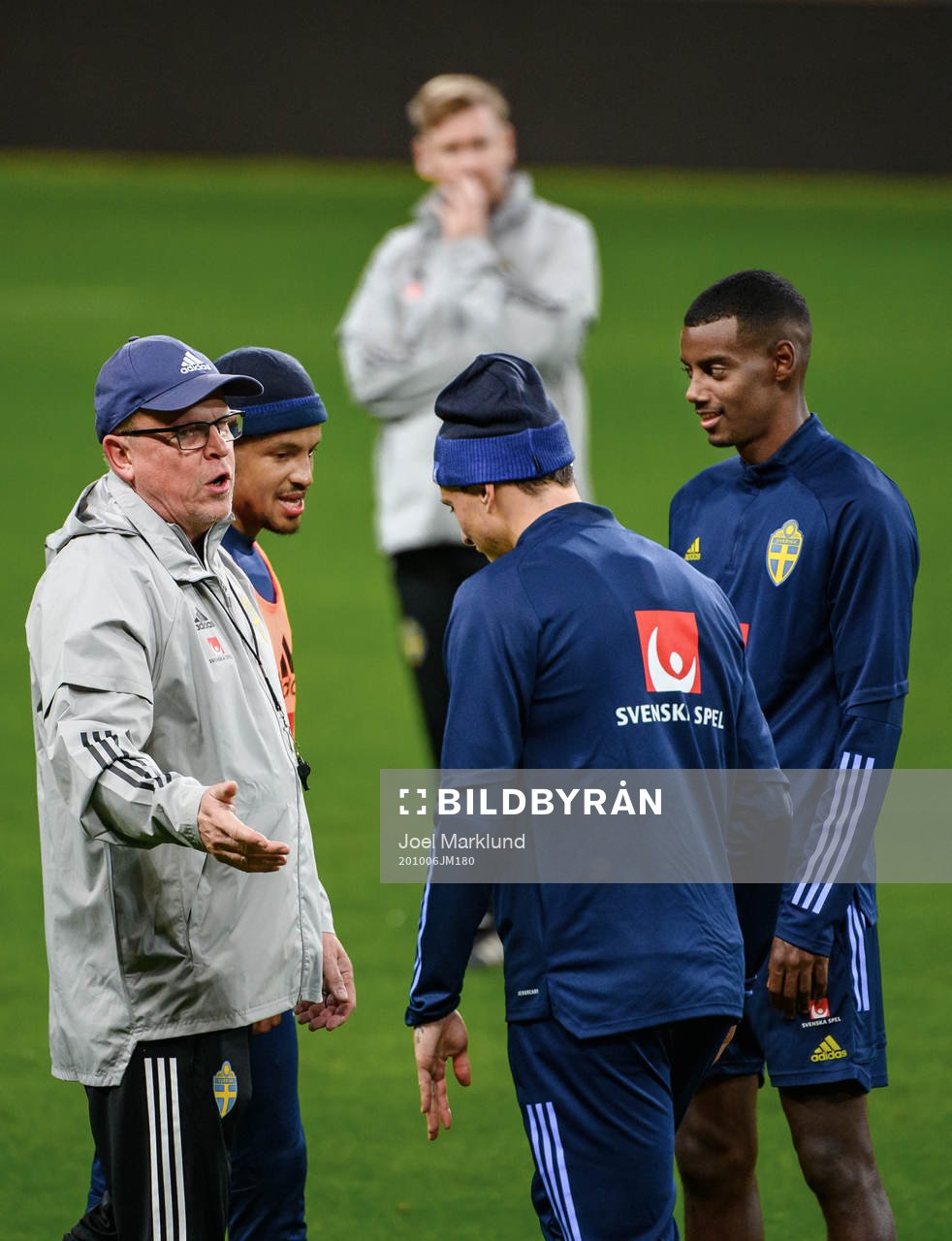 Head coach Janne Andersson, Martin Olsson, Victor Nilsson