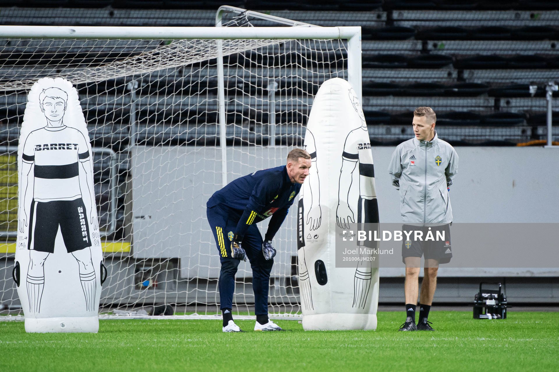 Goalkeeper Robin Olsen and goalkeeper coach Maths Elfvendal