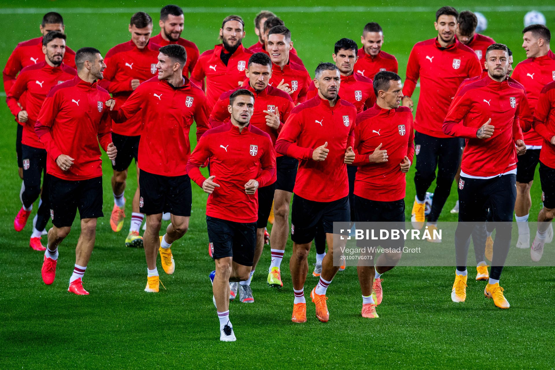 Aleksandar Kolarov and players of the Serbian national