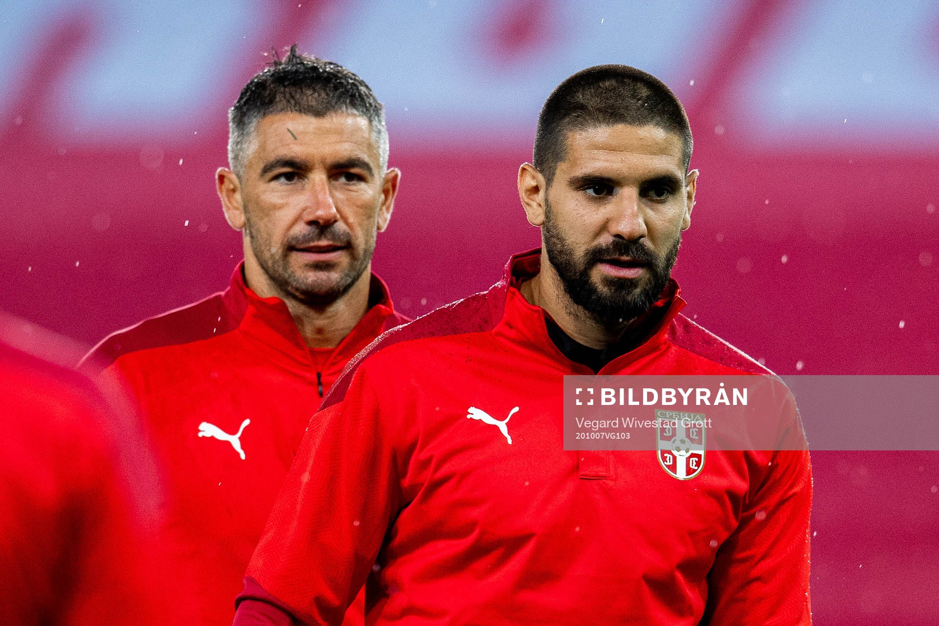 Aleksandar Kolarov and Aleksandar Mitrović of the Serbian
