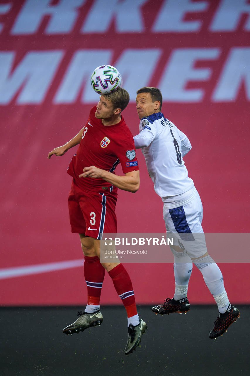 Kristoffer Ajer of Norway and Nemanja Maksimovic of Serbia
