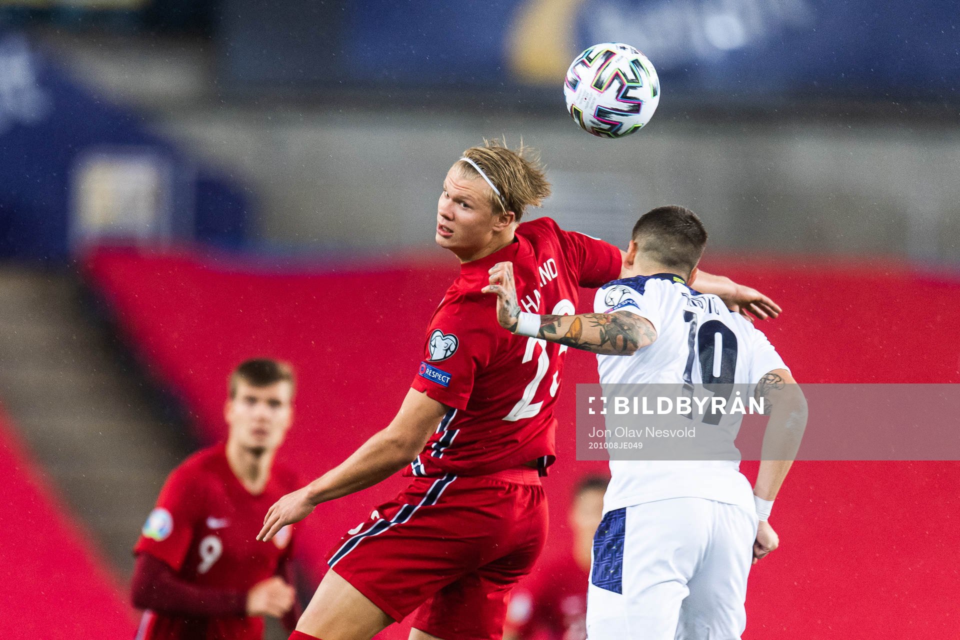 Erling Braut Haaland of Norway and Mihailo Ristic of Serbia