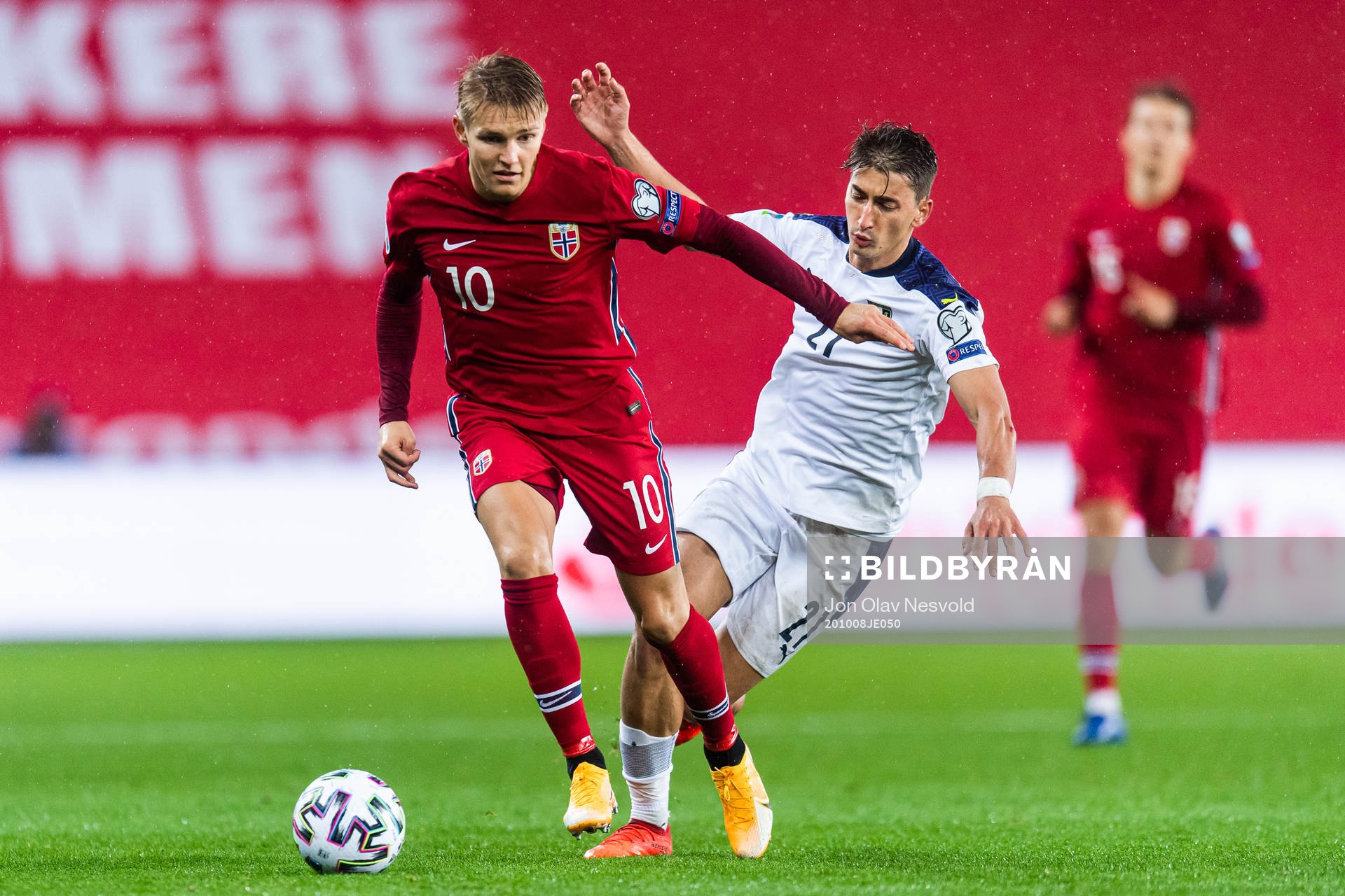 Martin Ødegaard of Norway and Filip Djuricic of Serbia