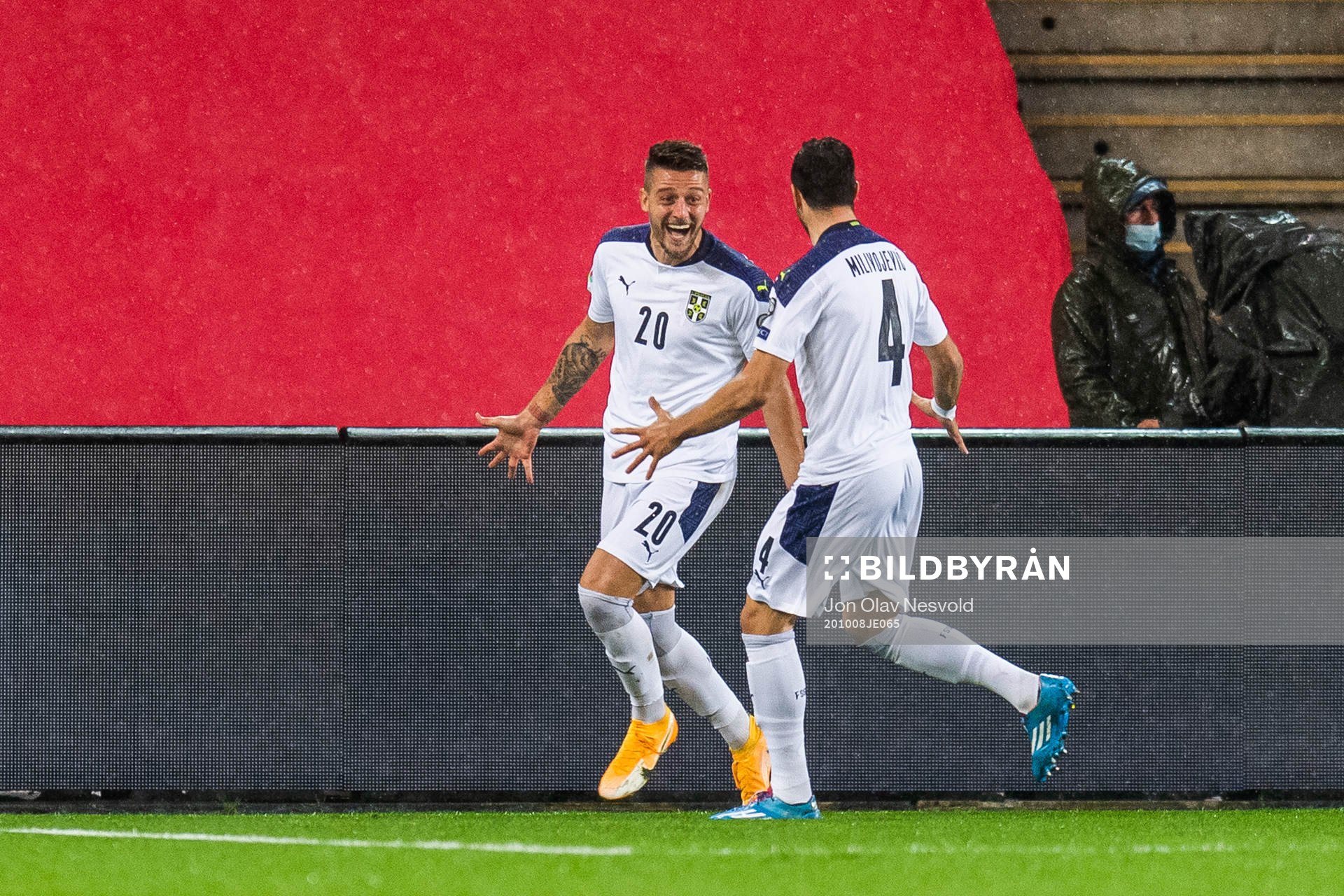 Sergej Milinkovic-Savic and Luka Milivojevic of Serbia