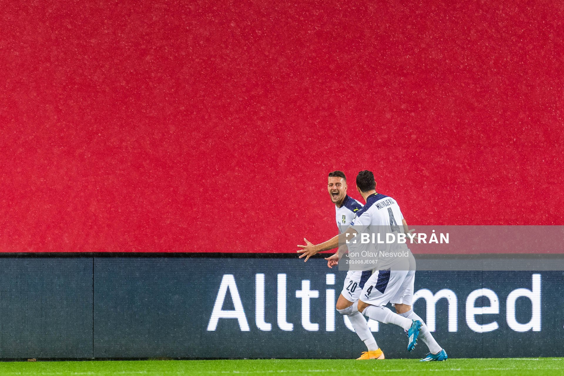 Sergej Milinkovic-Savic and Luka Milivojevic of Serbia celebrate after 0-1 during the UEFA Euro Qualifier play-off semi-final football match between Norway and Serbia on October 8, 2020 in Oslo.
