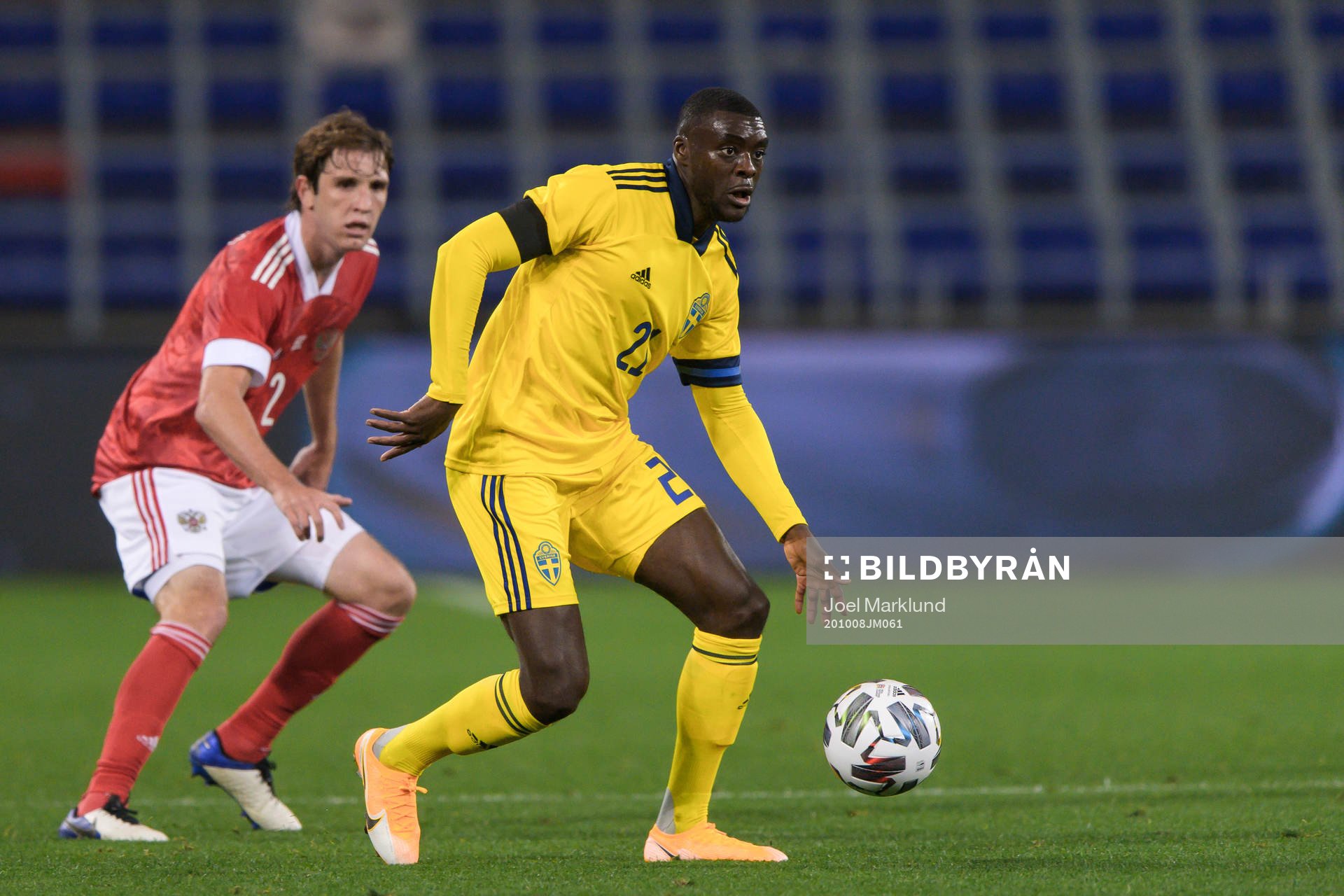 Mario Fernandes of Russia and Ken Sema of Sweden