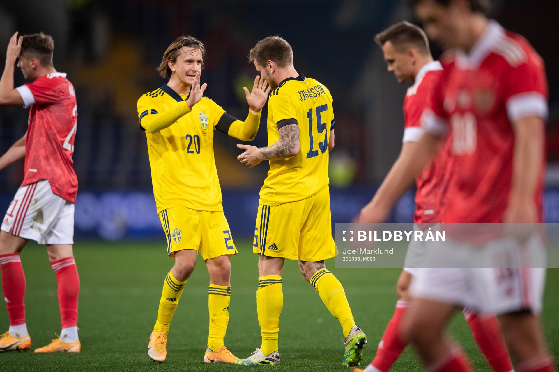 Kristoffer Olsson and Mattias Johansson of Sweden celebrate