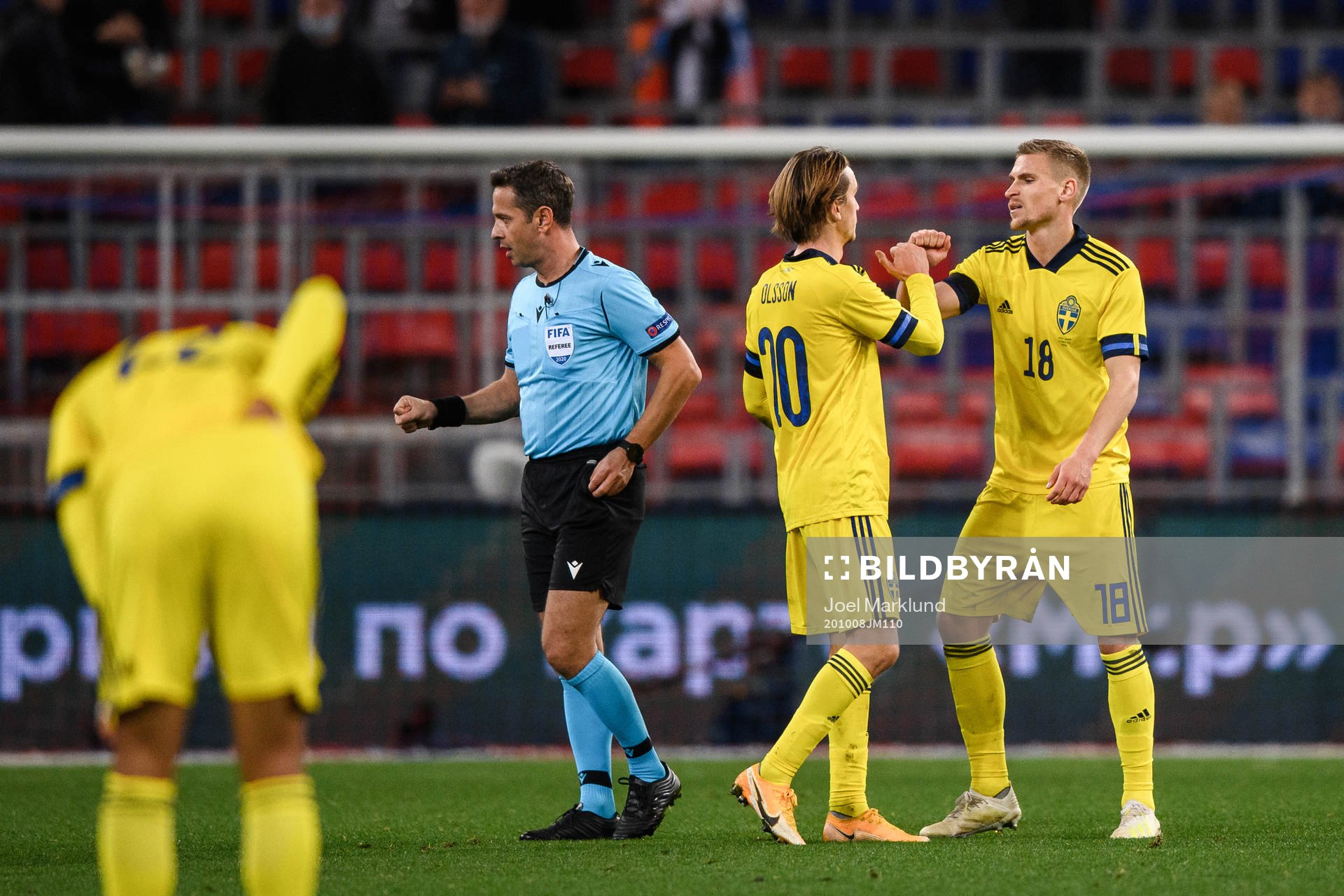Kristoffer Olsson and Carl Starfelt of Sweden celebrate after the international friendly football match between Russia and Sweden on October 8, 2020 in Moscow.