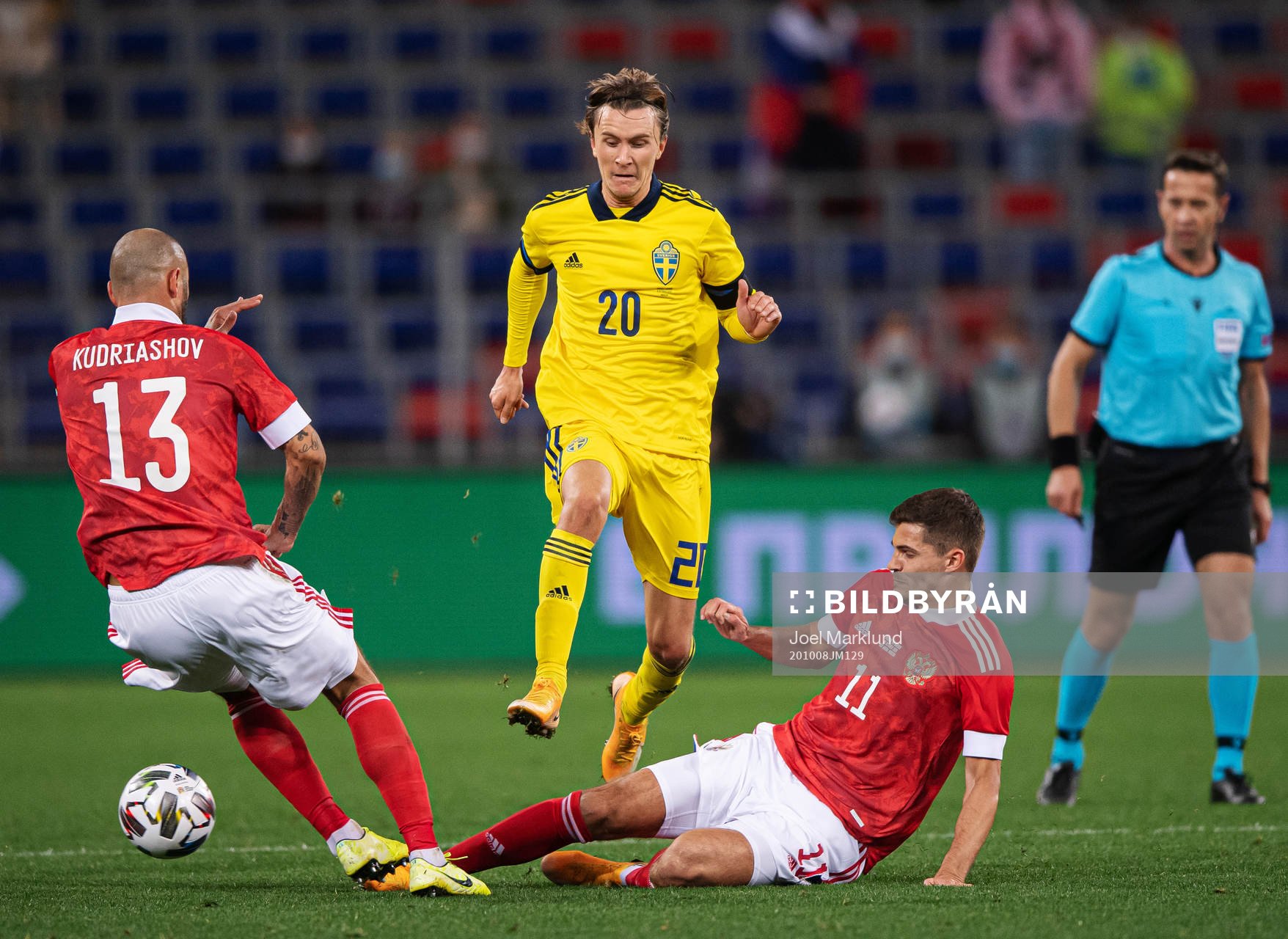 Fedor Kudryashov and Roman Zobnin of Russia are being
