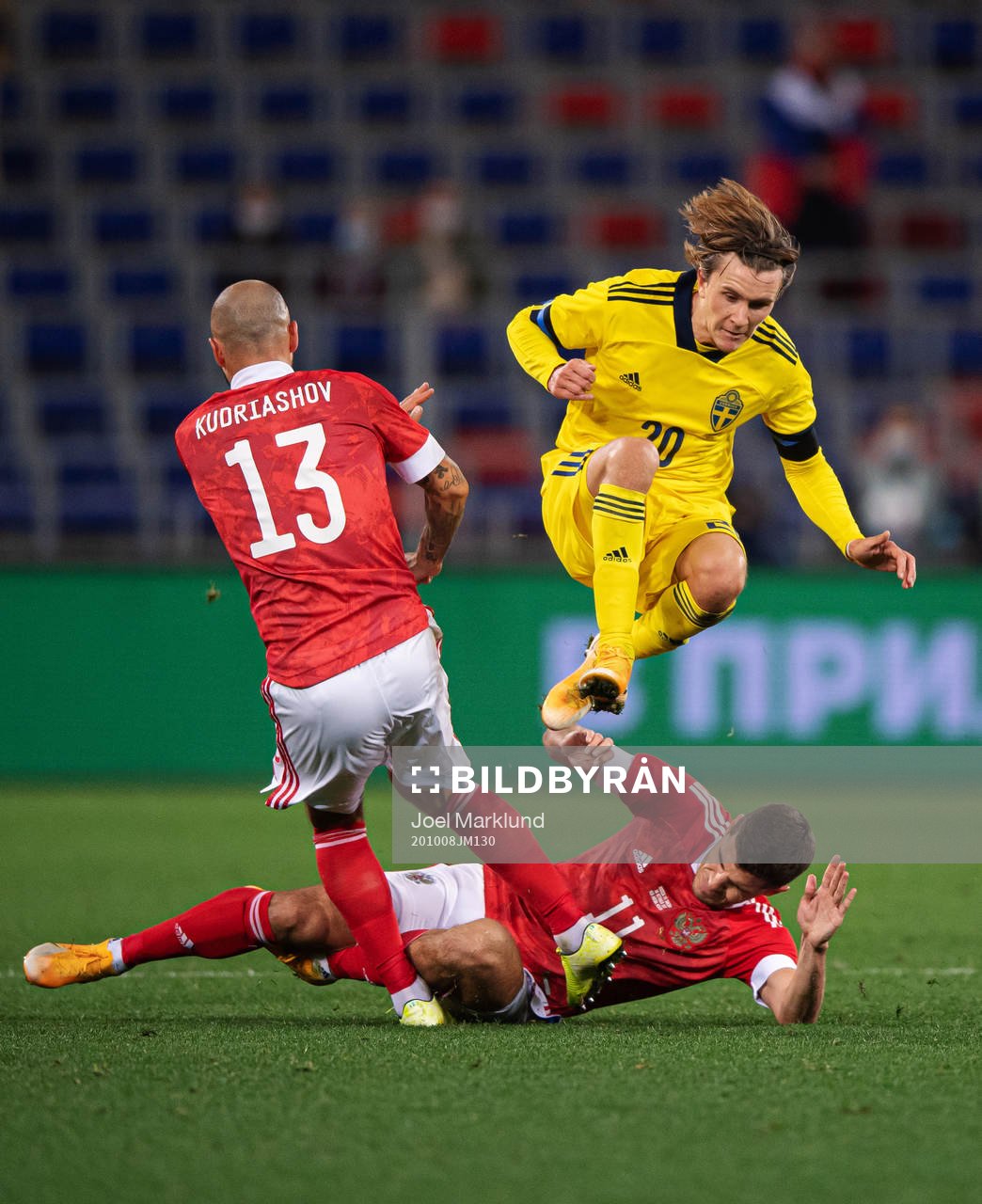 Fedor Kudryashov and Roman Zobnin of Russia are being