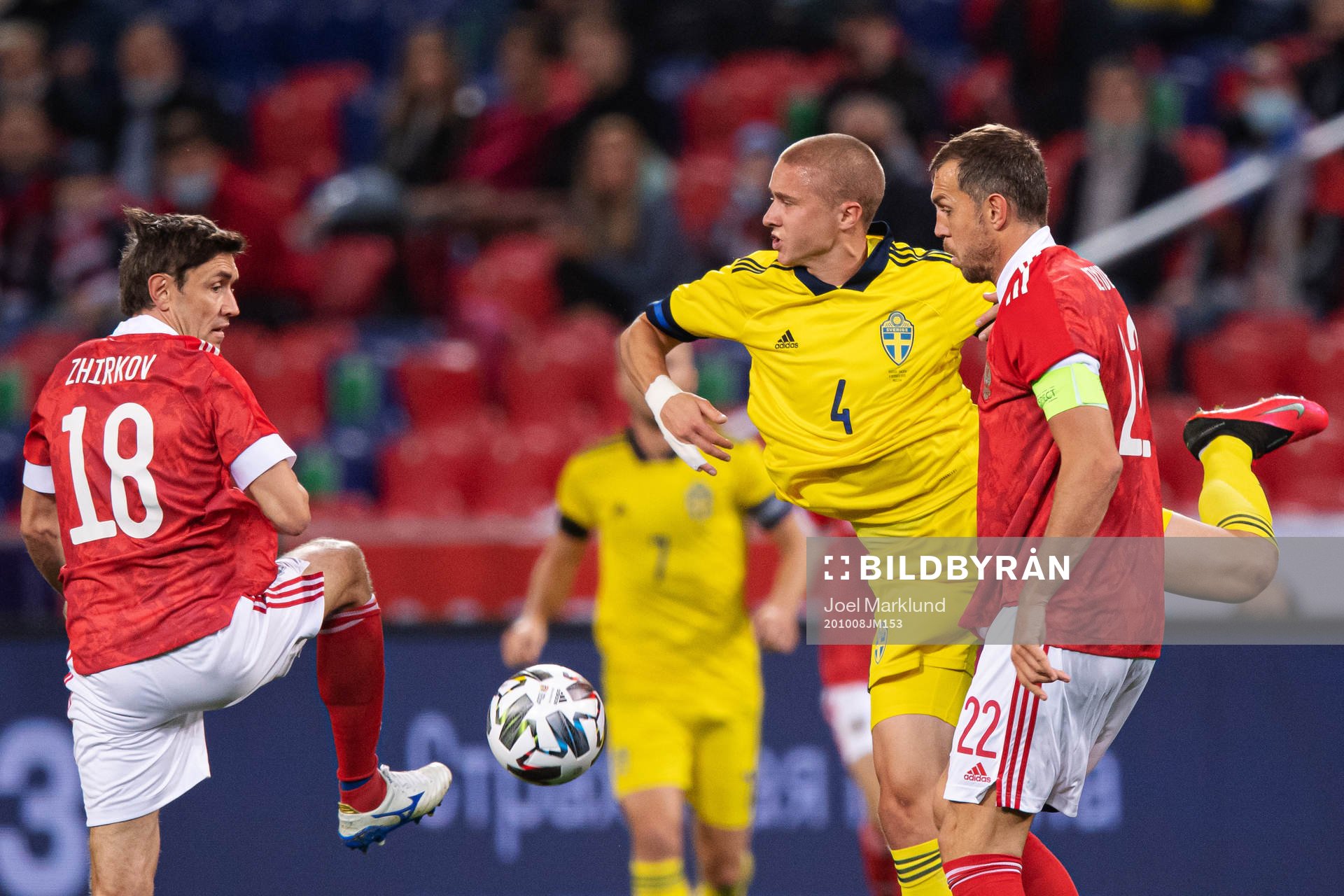 Yuri Zhirkov and Artem Dzyuba of Russia are being