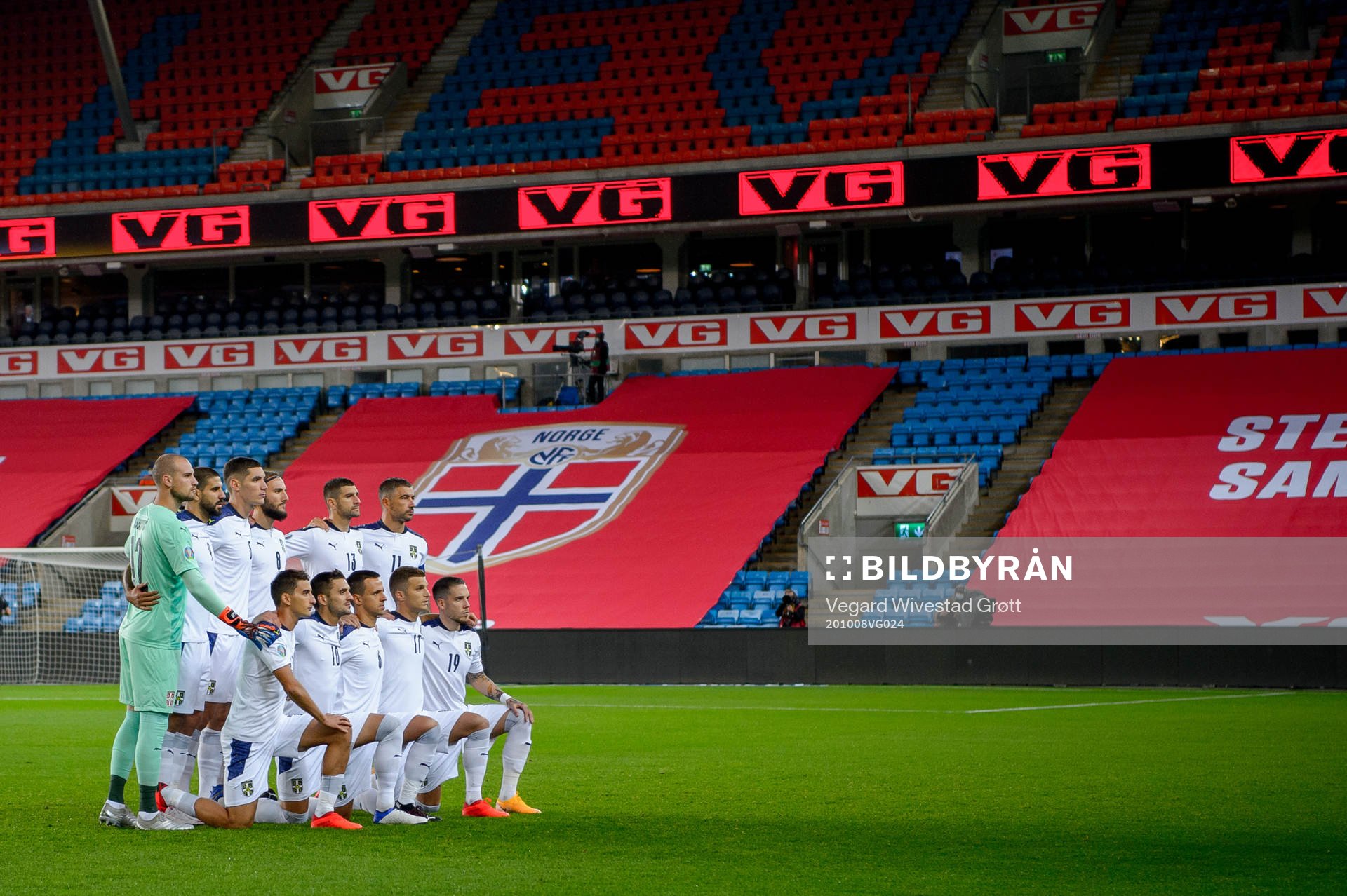 The starting eleven of Serbia pose for a team photo ahead