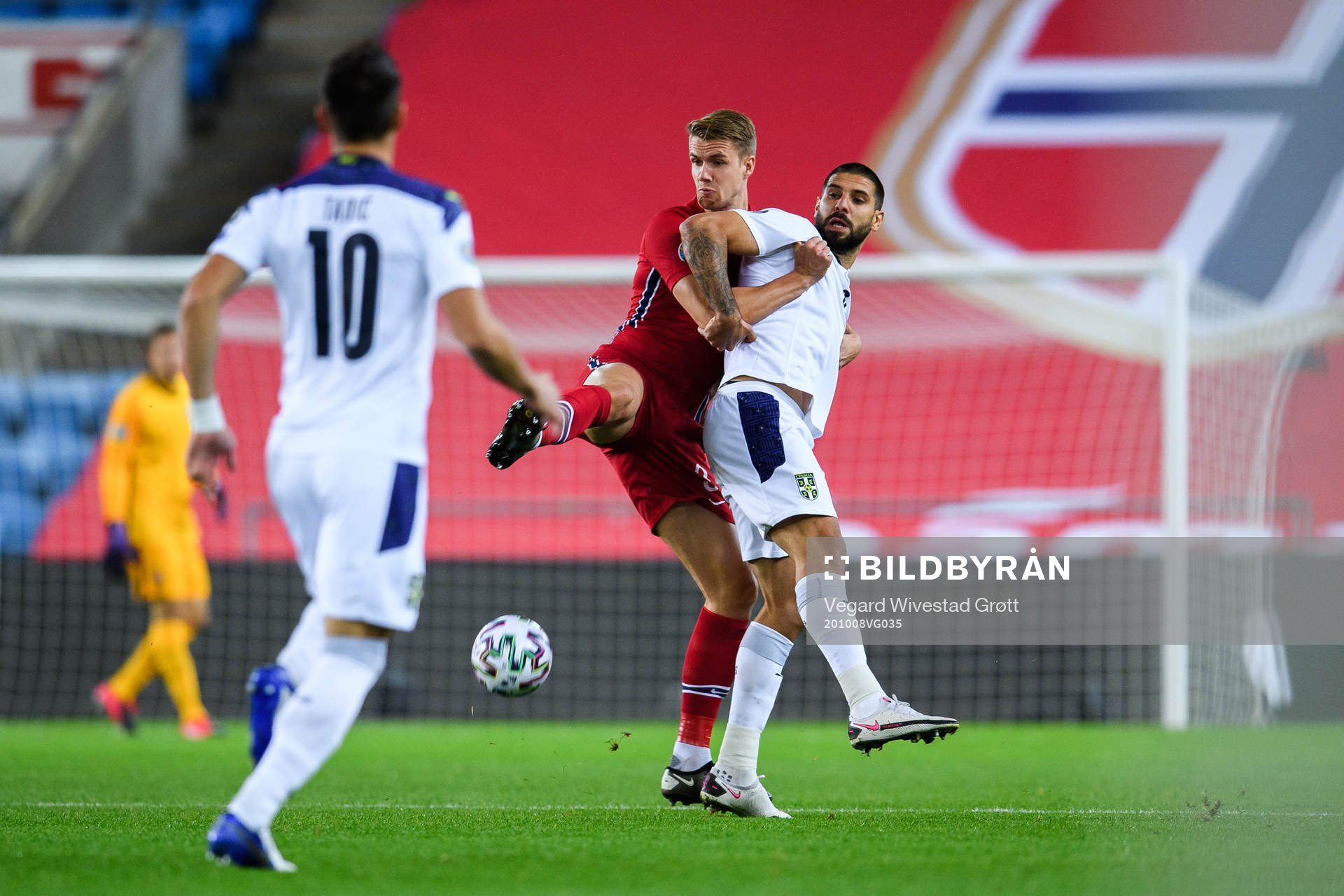 Kristoffer Ajer of Norway and Aleksandar Mitrovic of Serbia