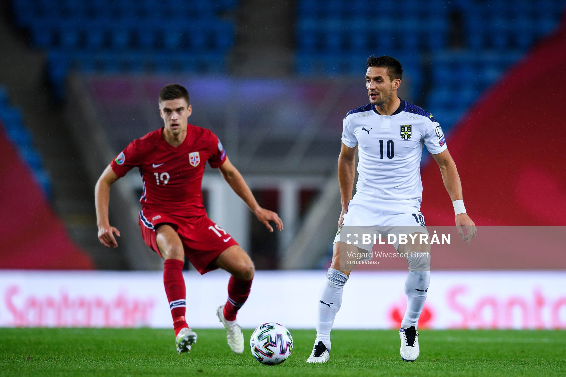 Markus Henriksen of Norway and Dusan Tadic of Serbia