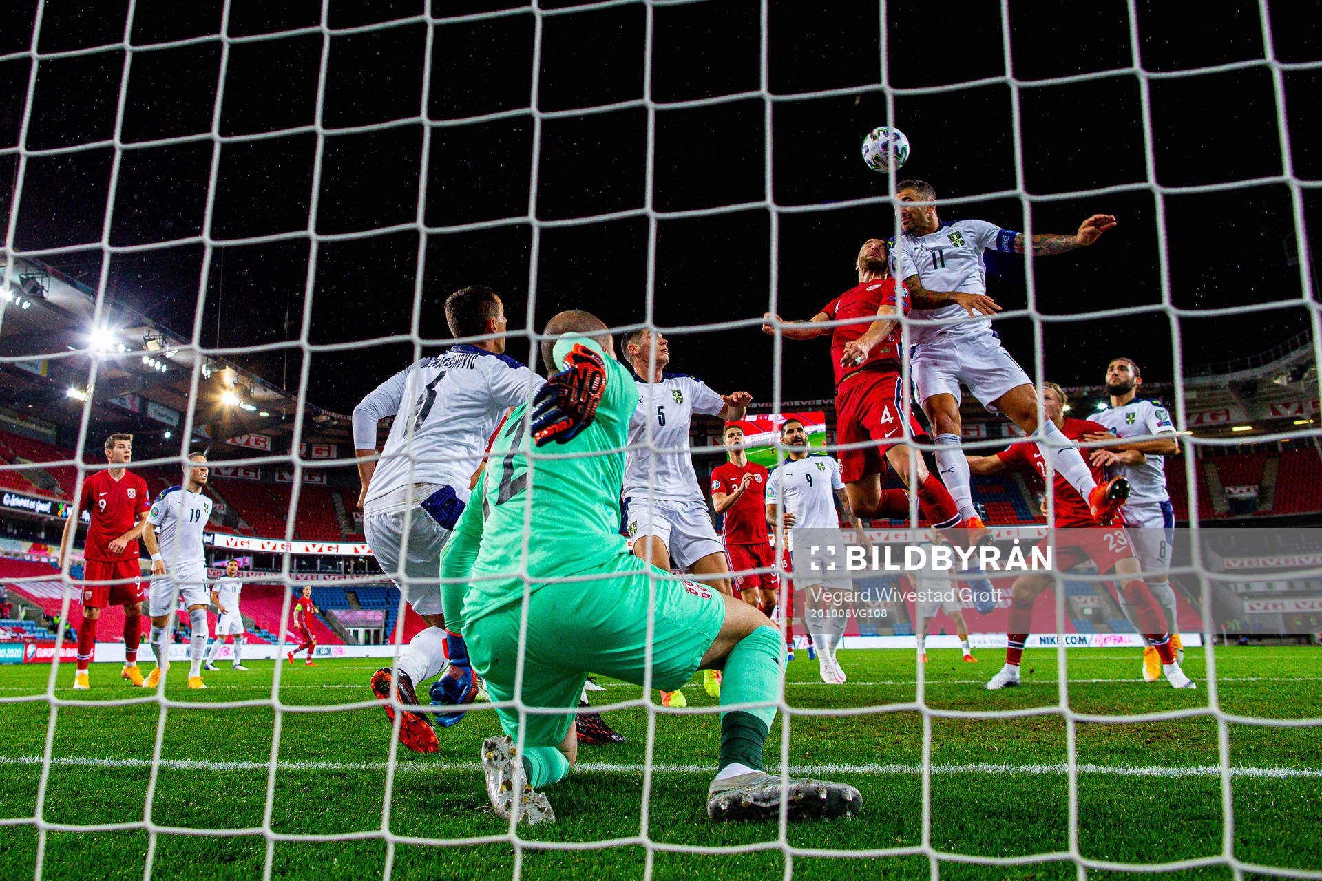 Tore Reginiussen of Norway and Aleksandar Kolarov of Serbia