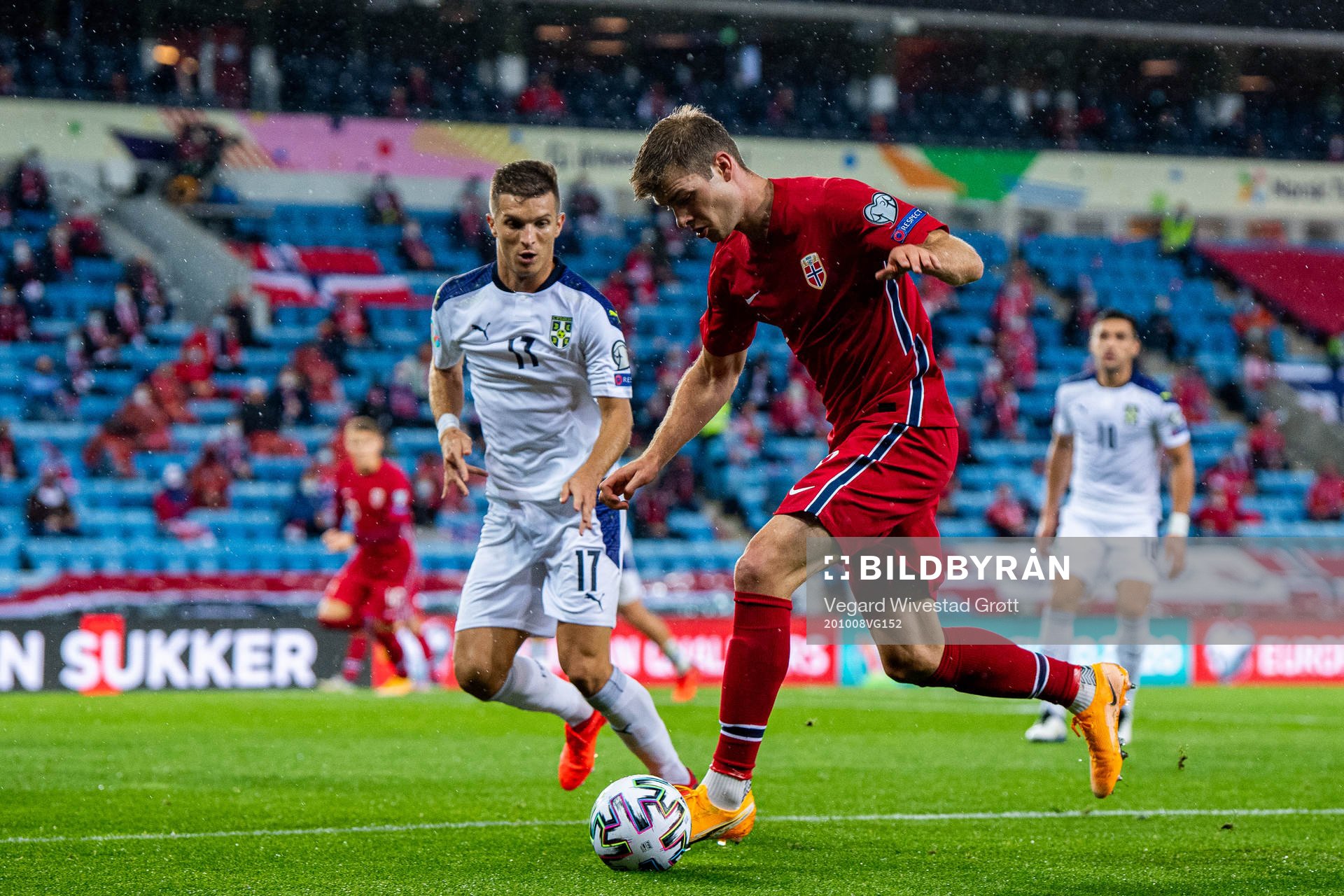 Darko Lazovic of Serbia and Alexander Sørloth of Norway