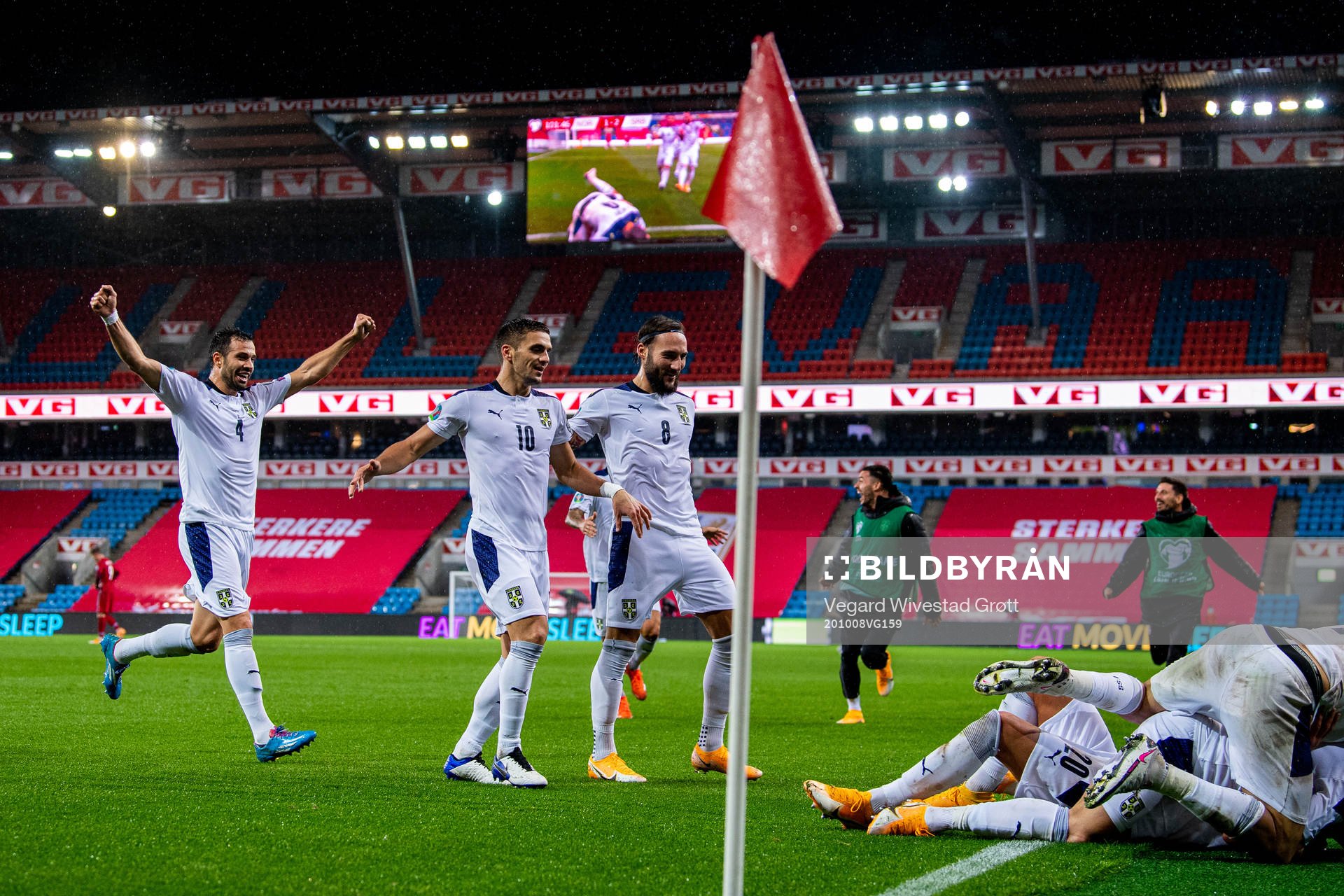 Luka Milivojevic, Dusan Tadic and Nemanja Gudelj celebrate the 1-2 goal during the UEFA Euro Qualifier play-off semi-final football match between Norway and Serbia on October 8, 2020 in Oslo.